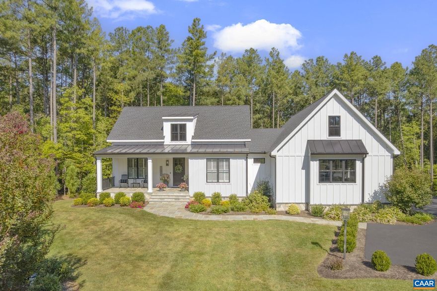 This is a truly exceptional home for the discerning buyer, custom designed and crafted by a premium builder with top-end everything: 2x6 construction; 10 ft living room ceilings with authentic antique wood beams; gourmet kitchen with Wolf gas cooktop, two Wolf ovens, an enormous island, stunning quartz, stained Merillat Masterpiece collection cabinets, two expansive pantries & more; an elegant dining room; a spacious screened-in porch overlooking a beautiful patio, firepit and private backyard oasis where no one can build behind; a primary bedroom suite that boasts a luxurious bathroom with large shower (no glass!), dual vanities and huge walk-in closet; an office/bedroom equipped with a built-in king-size Murphy bed (looks like a beautiful cabinet); and a convenient laundry room, all of which completes one-level living absolutely bathed in natural light. Downstairs features 9 ft ceilings, a den & walk-out to the covered patio & hot tub, with two bedrooms & full bath for an ideal guest retreat. Plus a TON of storage! Don?t miss the long list of exceptional features in the documents tab! Conveniently located to Rtes 250, 15 and 64 for close proximity to Zions Crossroads, and an easy drive to downtown C?ville, Short Pump & Richmond!,Quartz Counter,Wood Cabinets,Fireplace in Living Room