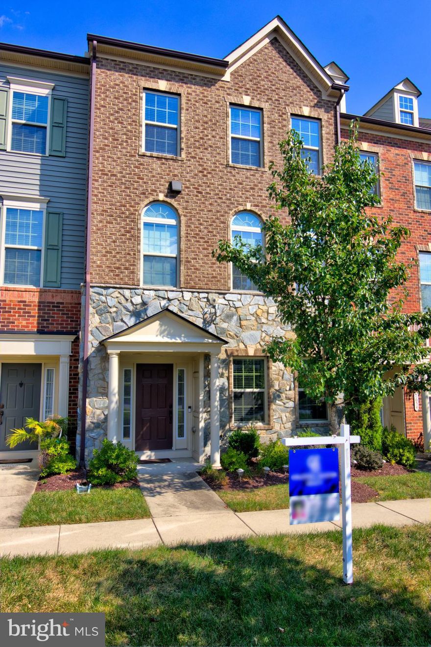 Awesome three level townhome in popular Parkside community*Gorgeous stone and brick front*Main level has living room/kitchen with huge bar/family room/half bath*Upstairs has 3 bedrooms and 2 full baths,laundry room*Lower level has rec room(carpet and ceramic), full bath, storage and 2 car garage*Ceilings on main level are 9 ft*There are two French doors on main level with palladium windows (with transom above) off of the family room to the full length trex deck which is 10x20*Main level has maple hardwood wide plank floors and eyeball lights*Gourmet kitchen has huge island great for accompanying chairs, ss appliances, granite,cream cabinets with chocolate glaze,pantry*Custom louvred shades thruout*Master bedroom is spacious with 2 walkin closets and fabulous owner's bath with oversized shower with 2 seats and two showerheads, granite top vanity,private water closet*Tankless hot water heater*Big closets*3 bidets