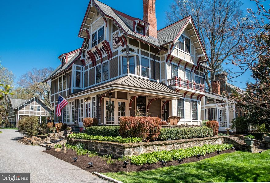 Welcome to 307 Elm Avenue - a totally renovated, 5 bedroom - 3 full and 2 half bath Victorian home originally built in 1884 and located in wonderful Swarthmore.... just a short walk to the Ville! ...In the summer, enjoy the wraparound front patio along with the amazing fenced backyard with heated, inground hot tub and  pool, Bose sound system, outdoor shower, heated changing/powder room and 2 porches ...... As the seasons change, relax by the outdoor stone fireplace, entertain in the sunken family room or escape to the 2nd floor garage: yoga, studio or office space is all possible here!  The award winning Kitchen designed by Main Line Kitchens boasts honed marble counters and island, Brighton Cabinetry, DCS commercial range and Zephyr hood, ceramic metallic tile floor, and Samsung flex zone control refrigerator, and opens to the dining room...that opens to the family room....that opens to the living room...that wraps around to the butler's pantry....and the secluded outdoor Patio.  The primary suite is a gem! Ensuite Master bath modernized to today's  standards includes heated tile floor,  spa shower, teacup soaking tub, imported wallpaper and custom double bowl vanity   you'll never want to leave. Last but not least, don't forget to find the 'hidden' work out room in the Basement. Other comfort features of this lovely home include a second laundry station on the third floor, dual-zone beverage refrigerator, commercial grade Wi-Fi in both the main house and the garage and a newer roof installed in 2015 that matches the architectural details of the original.  Over 5,000 SF of living space.  You're within walking distance to the train station, elementary school, and vibrant downtown Swarthmore restaurants and shopping........The town is known for its award-winning schools, and an easy commute to the Philadelphia Airport, major highways and recreational facilities including Ridley Creek State Park.