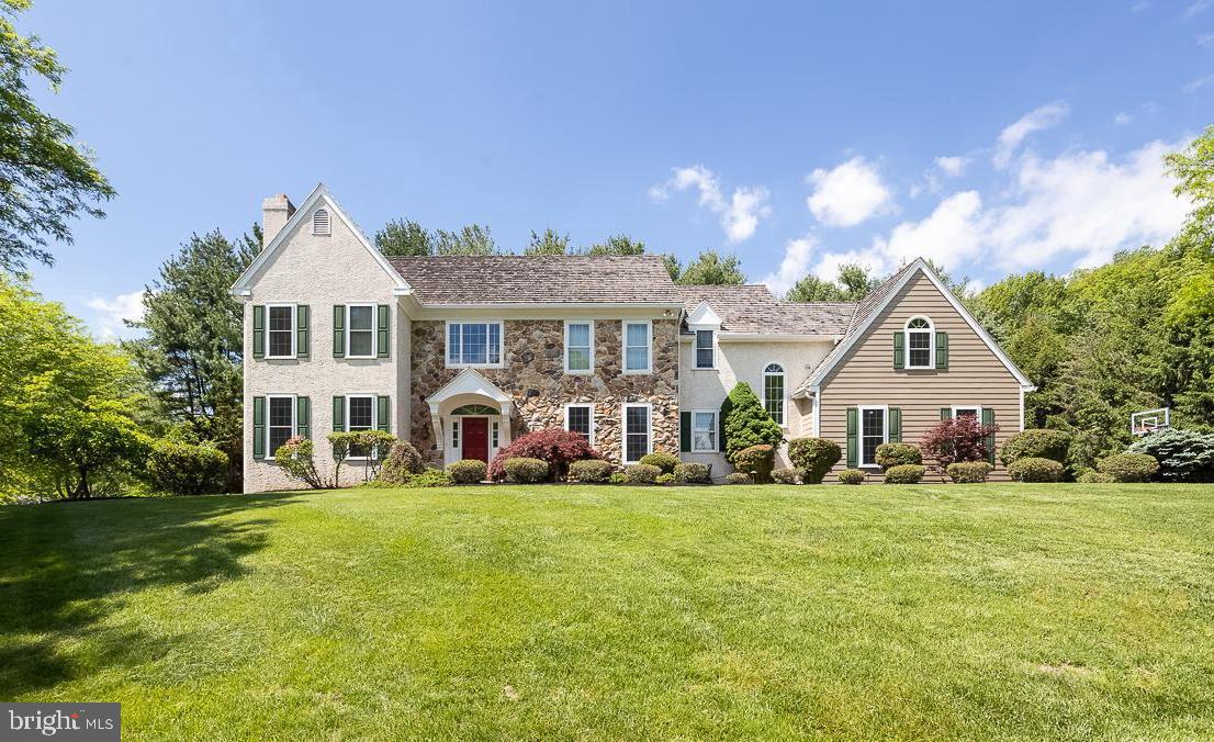 Welcome to 695 Highpoint Drive—A Grand Residence in the Coveted Unionville-Chadds Ford School District Nestled in a highly desirable West Chester location, this sprawling estate sits in the award-winning Unionville-Chadds Ford School District and offers unmatched convenience with easy access to Routes 202, 926, 1, and I-95—making daily travel and commuting a breeze. With 5 bedrooms, 4 full bathrooms, and 2 powder rooms, this impressive home blends timeless elegance with modern upgrades. A newly installed paver walkway leads to the elegant two-story foyer, where a stunning spiral staircase, pristine hardwood floors and neutral paint palette. Flanking the entryway are two exquisite formal spaces: a sun-soaked sitting room framed by floor-to-ceiling windows and a marble-surround fireplace, and a spacious dining room featuring tray ceilings, wainscoting, and detailed chair rail molding. The heart of the home is the soaring family room, highlighted by a dramatic floor-to-ceiling fieldstone fireplace and arched windows. Flowing seamlessly into the expansive kitchen, this layout is ideal for both everyday living and grand-scale entertaining. The kitchen boasts white cabinetry, a large center island with cooktop, double wall oven, stainless steel appliances, recessed lighting, a sideboard, and a walk-in pantry. The large breakfast space adds to every day use and sits adjacent to the sliders leading you out back. A first-floor office provides a quiet retreat, conveniently located near a powder room. Ample closet space and a secondary powder room complete the main level, along with a second staircase leading to the private quarters. Double doors open to the luxurious primary suite, complete with a tray ceiling, new carpeting, ceiling fan, and a private sitting room behind French doors. A large dressing area with double walk-in closets leads to the ensuite featuring tile flooring, a soaking tub, walk-in tile shower, skylights, and a private water closet. Down the hall, a second ensuite bedroom offers additional flexibility and comfort, while three more generously sized bedrooms share a full bath and access to an upper-level laundry room with cabinetry and utility sink. The finished walk-up daylight basement expands the living space with a dedicated theatre room equipped with built-in speakers and AV tower, a second living area with custom built-in cabinetry ideal for a home office or after school studies. Two large bonus rooms with expansive closets—perfect for guests, a gym, or hobby rooms. An open storage room adds to the home’s exceptional functionality. Step outside to a level, private backyard bordered by mature landscaping. The large deck offers serene evergreen-lined views—ideal for relaxing or entertaining in complete privacy. The home also features a charming cedar shake roof and fresh paint and carpeting throughout. Don't miss the opportunity to own this exceptional home in one of Chester County’s most sought-after locations!!