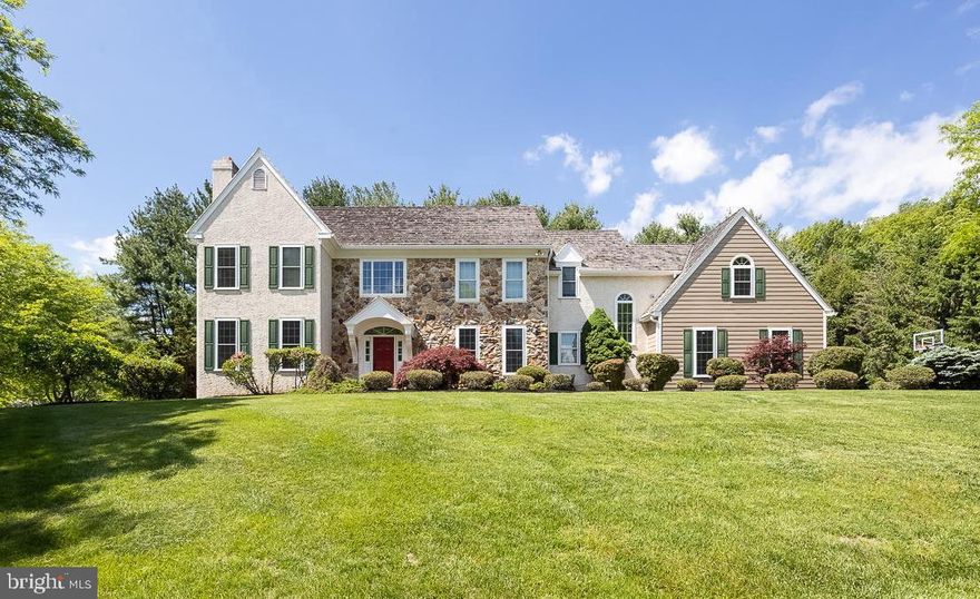 Welcome to 695 Highpoint Drive—A Grand Residence in the Coveted Unionville-Chadds Ford School District  Nestled in a highly desirable West Chester location, this sprawling estate sits in the award-winning Unionville-Chadds Ford School District and offers unmatched convenience with easy access to Routes 202, 926, 1, and I-95—making daily travel and commuting a breeze. With 5 bedrooms, 4 full bathrooms, and 2 powder rooms, this impressive home blends timeless elegance with modern upgrades. A newly installed paver walkway leads to the elegant two-story foyer, where a stunning spiral staircase, pristine hardwood floors and neutral paint palette.  Flanking the entryway are two exquisite formal spaces: a sun-soaked sitting room framed by floor-to-ceiling windows and a marble-surround fireplace, and a spacious dining room featuring tray ceilings, wainscoting, and detailed chair rail molding. The heart of the home is the soaring family room, highlighted by a dramatic floor-to-ceiling fieldstone fireplace and arched windows. Flowing seamlessly into the expansive kitchen, this layout is ideal for both everyday living and grand-scale entertaining. The kitchen boasts white cabinetry, a large center island with cooktop, double wall oven, stainless steel appliances, recessed lighting, a sideboard, and a walk-in pantry. The large breakfast space adds to every day use and sits adjacent to the sliders leading you out back.  A first-floor office provides a quiet retreat, conveniently located near a powder room. Ample closet space and a secondary powder room complete the main level, along with a second staircase leading to the private quarters.  Double doors open to the luxurious primary suite, complete with a tray ceiling, new carpeting, ceiling fan, and a private sitting room behind French doors. A large dressing area with double walk-in closets leads to the ensuite featuring tile flooring, a soaking tub, walk-in tile shower, skylights, and a private water closet. Down the hall, a second ensuite bedroom offers additional flexibility and comfort, while three more generously sized bedrooms share a full bath and access to an upper-level laundry room with cabinetry and utility sink. The finished walk-up daylight basement expands the living space with a dedicated theatre room equipped with built-in speakers and AV tower, a second living area with custom built-in cabinetry ideal for a home office or after school studies. Two large bonus rooms with expansive closets—perfect for guests, a gym, or hobby rooms. An open storage room adds to the home’s exceptional functionality.  Step outside to a level, private backyard bordered by mature landscaping. The large deck offers serene evergreen-lined views—ideal for relaxing or entertaining in complete privacy. The home also features a charming cedar shake roof and fresh paint and carpeting throughout.  Don't miss the opportunity to own this exceptional home in one of Chester County’s most sought-after locations!!