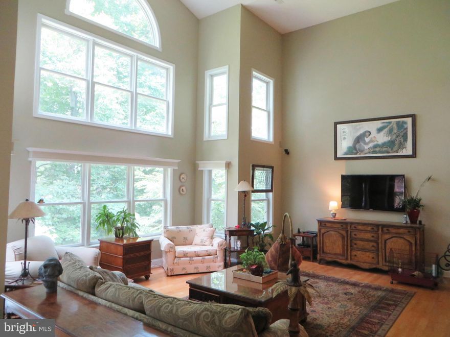 2003 home has nostalgic farmhouse "look", lovely contemporary interior, on gorgeous Cuckold Ck w/pier, 12K lb lift, H20, elec! Two-story great rm shares dbl-sided FP w/sunrm; upgraded KT w/granite, pantry, brkfst bar; DR, BR & bath. Upstairs: MBR w/cath ceiling; mbath w/jet tub; laundry/craft rm; 3rd BR & loft. Fin LL w/fam rm, 4th BR & 3rd bath, laundry rm, wrkshp. Carport, shed, screened porch!