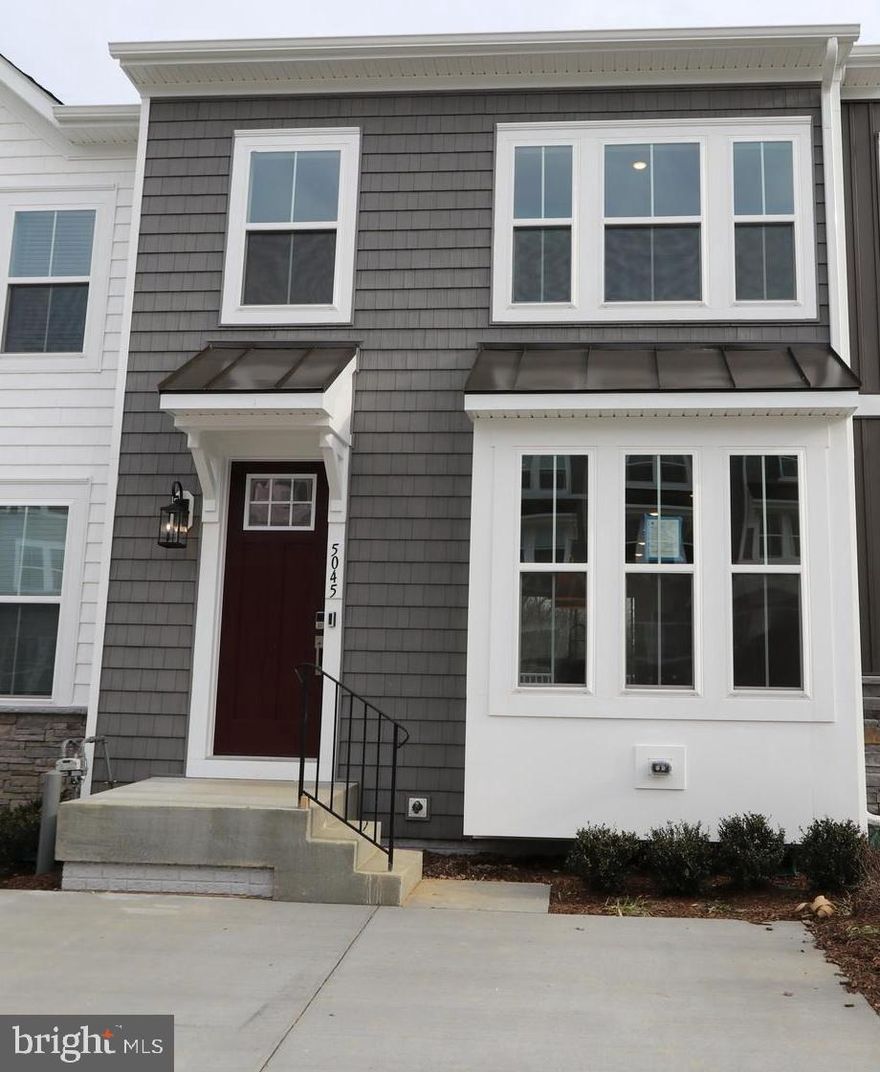 Brand new, never-lived-in rental home offering modern luxury in a prime location! This stunning property features 4 spacious bedrooms, 3.5 baths, a formal living room, separate dining area, recreation room, and three elegantly designed levels. The primary suite boasts an elegant tray ceiling, expansive walk-in closet, and spa-inspired bath with dual sinks, quartz countertops, and a generously sized shower. The gourmet kitchen includes an extended island, premium cabinetry, and modern appliances, flowing seamlessly into a bright, open living area ideal for entertaining. Enjoy peaceful wooded views from the private deck, and additional living space in the fully finished walk-out basement, featuring a recreation room, extra bedroom, and full bath. Conveniently located near major attractions, I-95, shopping, and dining, this home offers both comfort and ease of commuting. Schedule your private tour today!