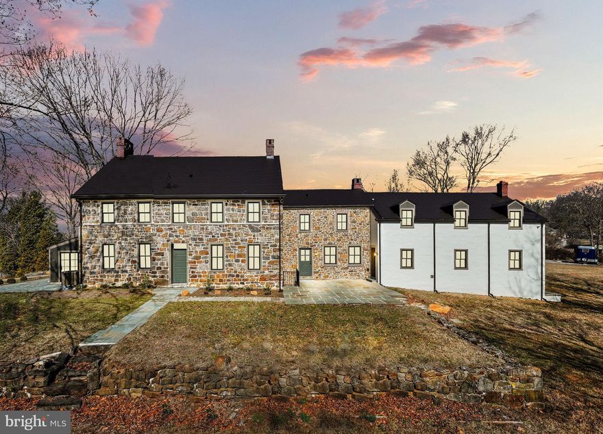 Where Historic Charm Meets Modern Sophistication — Welcome to 1796 Farmhouse Living, Reimagined

Step into a masterfully reimagined farmhouse estate that effortlessly blends historic charm with refined luxury. Originally built in 1796, this captivating residence has been thoughtfully updated to accommodate modern living while preserving the warmth and character of its origins. Nestled on over an acre of meticulously landscaped grounds in the highly desirable West Chester Area School District, this property offers a stunning main residence, a detached two-bedroom cottage—ideal for extended family, guests, or a future pool house—and a large barn on a separate 1.25 +/- acre lot with potential to be transformed into an approximately 7,000-square-foot living space.

Timeless Character Meets Modern Luxury
Inside the main home, you’ll find five spacious bedrooms, three of which feature beautifully appointed ensuite bathrooms. The primary suite is a serene retreat, boasting a spa-like bathroom outfitted with luxurious Kohler Castia plumbing fixtures, a freestanding soaking tub, and a custom walk-in shower designed for total relaxation.
Original wide plank hardwood floors, exposed hand-hewn beams, and vintage architectural details are seamlessly integrated with upscale modern finishes. At the heart of the home lies a chef’s dream: a gourmet kitchen equipped with top-of-the-line Thermador appliances, custom cabinetry, designer lighting, and a large center island—perfect for both casual meals and lively entertaining.

Smart Living - Thoughtfully Integrated
Designed for both beauty and functionality, the home features a fully integrated Sonos surround sound system throughout the interior and outdoor living spaces—ideal for hosting or simply enjoying immersive audio every day. A state-of-the-art security system with cameras provides peace of mind, while brand-new HVAC, electrical, and plumbing systems offer modern reliability wrapped in old-world charm. The home is topped with a striking metal slate roof, built to last for decades.

Living Spaces That Inspire
From a formal dining room to a cozy family room with a dramatic 10-foot stone fireplace, this home is made for gathering. The sun-drenched atrium offers panoramic views of the backyard oasis, while a tucked-away speakeasy-style lounge adds a sense of fun and discovery.

Outdoor Serenity & Private Guest Cottage
Thoughtfully designed for both entertaining and everyday function, the grounds feature distinct outdoor spaces including lush gardens and patios. A separate two-bedroom cottage provides ultimate privacy for guests or serves as a future pool house. Additional purposeful spaces like a custom mudroom and dedicated laundry room bring ease to modern living. Upstairs, a versatile third-floor loft—complete with an ensuite bath and spacious walk-in closet—can serve as a private primary suite or the perfect teen retreat.

A Unique Bonus — The Barn
Included with the estate is a large barn situated on a separate 1.25 +/- acre lot. Bursting with potential, this structure offers the opportunity to be converted into an approximately 7,000-square-foot living space—perfect for multi-generational living, a guest lodge, personal event space, or a truly one-of-a-kind creative retreat.

Location & Lifestyle
Ideally situated with easy access to top-rated schools, shopping, dining, and major commuter routes, this estate offers the best of both worlds: a tranquil country feel just minutes from the heart of lively downtown West Chester, home to a plethora of restaurants, local boutiques, and year-round events that bring the community to life.

Designed by Lauren Zappitelli
Every detail of this home was curated by interior designer Lauren Zappitelli, sister to the builder, blending elegance and comfort with a modern eye. For buyers seeking a seamless transition, custom turnkey furniture packages are available, professionally tailored to suit your lifestyle and aesthetic.