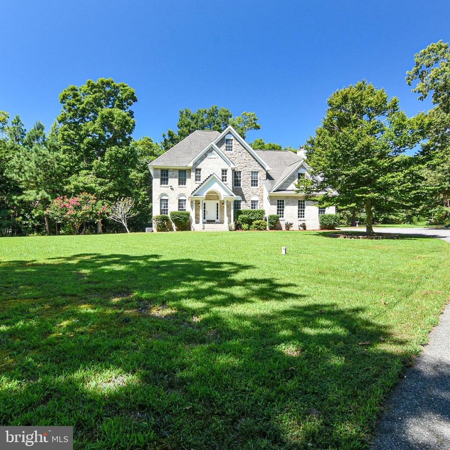 IMPROVED PRICE. WELCOME TO YOUR PRIVATE COUNTRY AND WATER ACCESS OASIS! This  is what living in the country is all about. The home is situated on a 16 acres picturesque setting.  This custom built colonial home features 4 bedrooms, 4 baths, and 3090 sq ft of living space. The main floor features Brazilian cherry wood floors in the foyer, a sitting room, a den with French doors for privacy, a formal dining room, kitchen and dining combo, a full bathroom with a stand up shower, arch molded hallways, sky lights, crown molding, custom cabinets, electric chandelier lowering switch, a family room with a fireplace that leads to a screened-in porch where you can connect with nature  and observe wild life. The upper floor features a spacious primary bedroom with tray ceiling and a large walk in closet and an unfinished panic hidden room.  Your guests will be overjoyed to have accommodation  in a second primary bedroom with their own bathroom for comfort and privacy.  There are two additional bedrooms that share a full bathroom on this level and a separate laundry room .  If you  love being on the water, you have access to the  community beach, pier and boat ramp. Try your luck at fishing off the pier for catfish, rockfish, perch, or you can try crabbing. Launch your boat from the boat ramp and you will have access directly to the Potomac River.  Centrally located in King George and an easy commute to NSWC Dahlgren, US 301 Nice/Middleton Bridge, Fredericksburg, Stafford, and Caroline Counties. Schedule a viewing and experience for yourself this charming country lifestyle in a water oriented community yet very close to shops, restaurants, and conveniences.  (This home is currently tenant occupied. Lease conveys through October 31, 2023.)