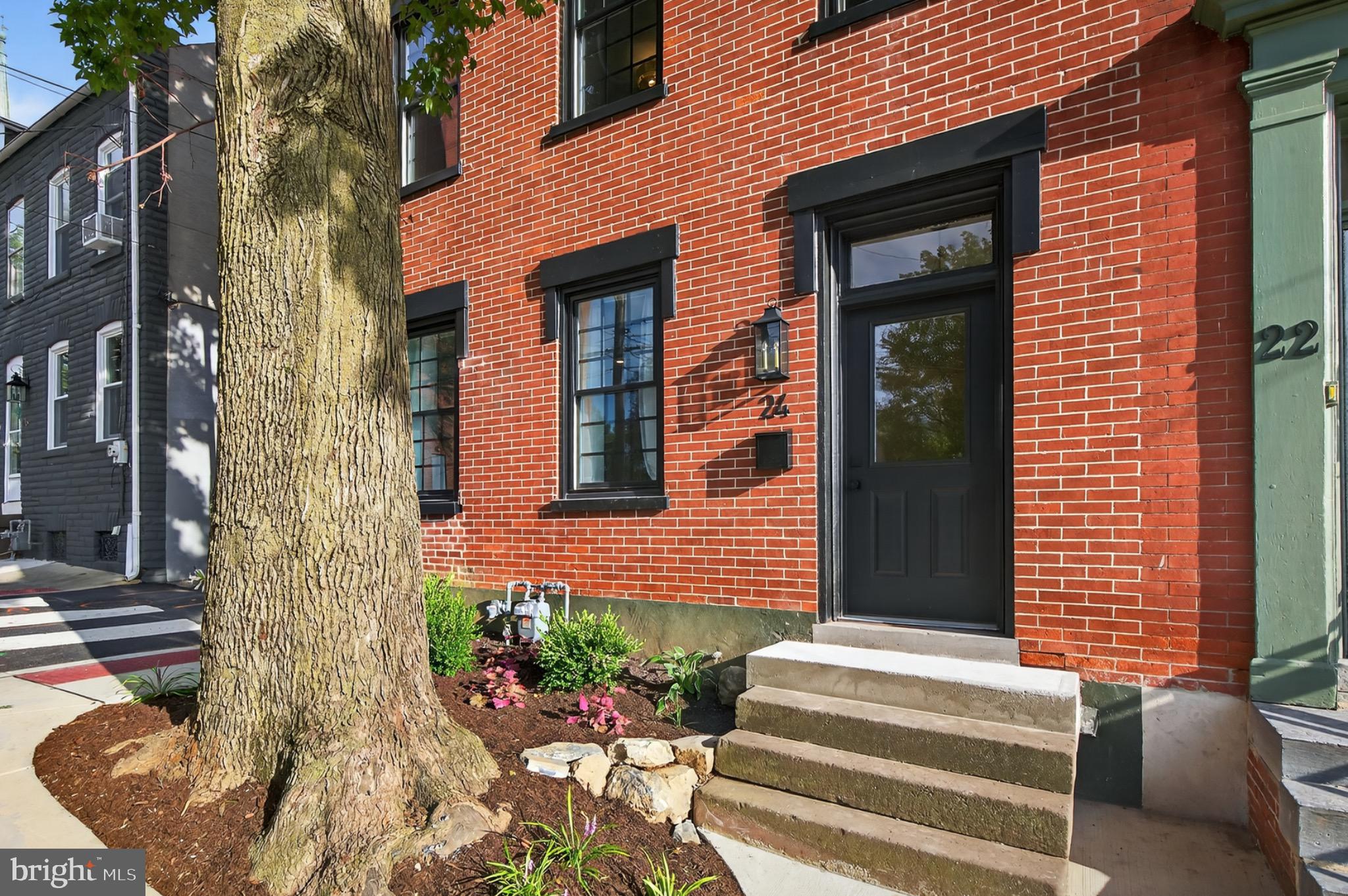 Welcome to this stunning 4-bedroom, 2.5 bath home in the heart of downtown Lancaster. Every inch of this property has been thoughtfully updated, blending timeless charm with modern conveniences. The City of Lancaster has capped short term rentals to specific zoning districts, creating high demand for Airbnbs in the City. 24 E. Farnum is in an unbeatable location, on the corner of the Central Business District and Mussertown neighborhoods and walking distance to Lancaster's culinary, nightlife, and arts scene. Local highlights include Southern Market, Lancaster County Convention Center, Lancaster Central Market, Lancaster County Courthouse, Penn Square, Lancaster Mariott, Fulton Theatre, Zoetropolis Cinema Stillhouse, and many other local shops, restaurants and bars, all within 3 blocks. With 2 highly sought after off-street paved parking spaces, outdoor space, and a completely renovated interior with stylish finishes and ample living space, this property offers modern convenience with boutique style living. Whether you're looking for a turnkey Airbnb investment property or a beautiful place to call home, 24 E. Farnum is a rare find!