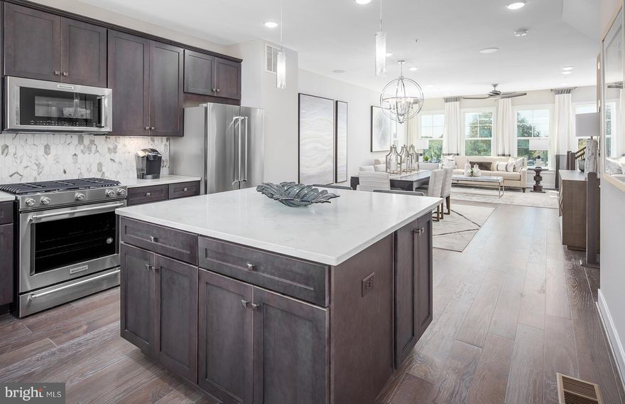 Enjoy the Frankton's spacious living area & open dining room. The large kitchen island perfect for gathering in the kitchen area. Use the optional ground-level room as a guest room or home office. The owner's suite has his-&-her walk-in closets. This beautiful 3 Level Pulte Townhome at Century Row is located just a short walk from the Germantown Town Center, transit center, Regal Movies, and less than 1 mi from 270, this is where location, lifestyle, and convenience converge. All located just minutes from Safeway, Wegmans and Topgolf, head to nearby Germantown Town Center to Beers and Cheers or watch a movie at the Regal Cinema. Head outdoors to Gunners Branch Local Park. Hit the trails at Gunners Branch Local Park. Nearby Germantown Town center Urban Park has summer festivals and space for dog walking, throwing a Frisbee or a volleyball match. Or head to Seneca Creek State Park.