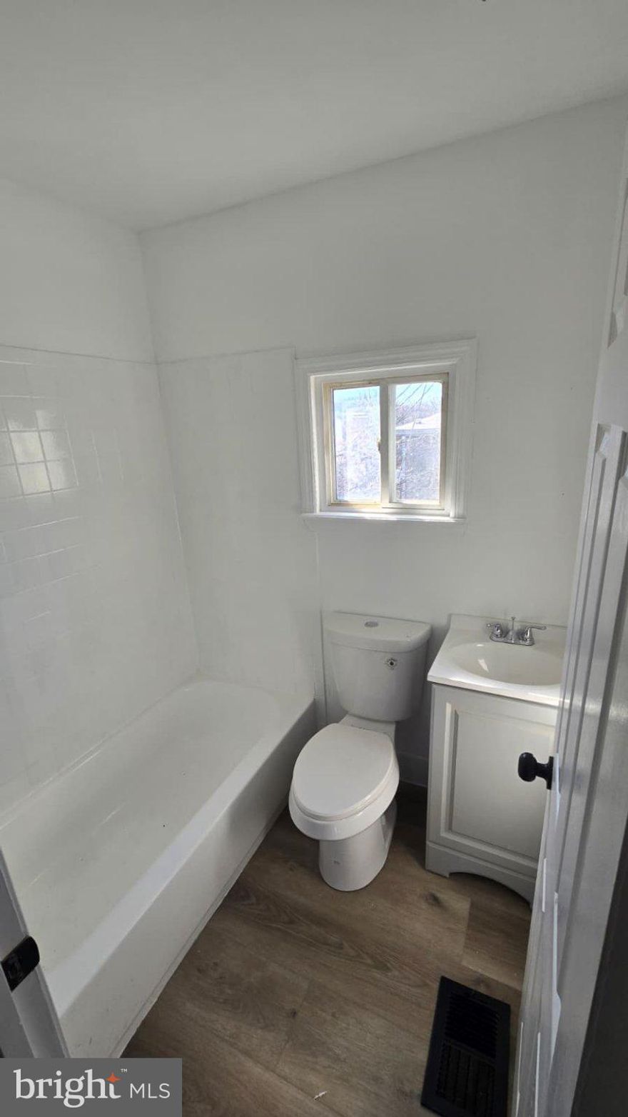 Fully renovated and move-in ready, this updated home offers modern finishes and a clean, functional layout throughout. The main level features durable flooring, neutral paint, and an open living area filled with natural light. The updated kitchen includes white cabinetry, sleek countertops, and a contemporary feel perfect for everyday living.

Upstairs, you’ll find well-sized bedrooms with fresh carpeting and a renovated full bathroom with updated fixtures and finishes. The home has been refreshed with new flooring, paint, and lighting throughout, creating a bright and cohesive space.
The lower level provides additional storage and utility space.
Ideal for homeowners or investors alike, this property offers low-maintenance living with modern updates at an affordable price point.