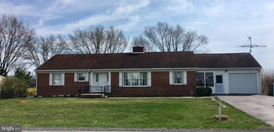 Great house on an amazing 1.3 acres.  This sturdy, move in ready house is waiting for you!  Wonderful living space with gorgeous oak flooring throughout- also under carpet.  Heat pump with oil backup.  Basement is full size of house with workshop and could be finished for more living space or extra bedroom!  This home is a must see.  Well still used for outside water source.