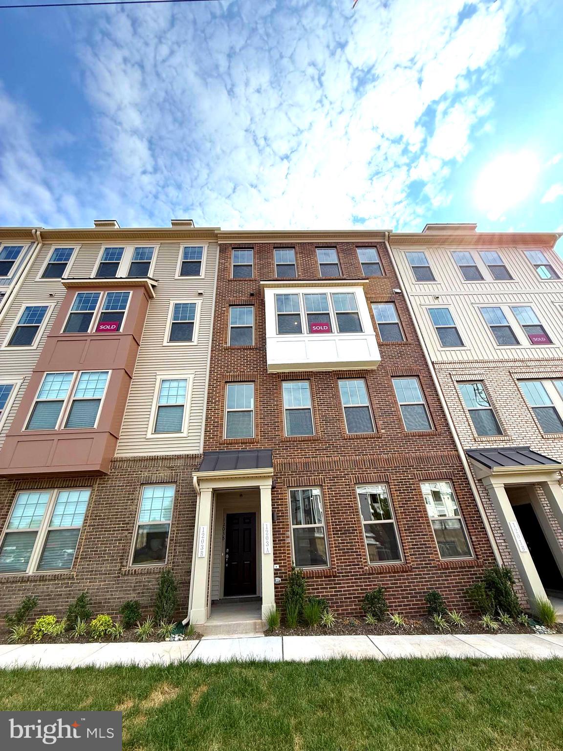 Brand New Stanley Martin 2 Level Garage Condo Village at Manassas Park is conveniently located amongst upcoming shopping, dining, entertainment, and outdoor recreation fun. MOVE-IN READY! Commuting convenience and low maintenance living is what we’re all about! Just a 2-minute walk to the Virginia Railway Express Station that will take you right into Washington D.C. Spend less time with commuting and maintenance and more time making memories with loved ones at home. Manassas Park City Hall at Park Central offers brand new 2-level public library with a brand new Sprinkler Park! Step inside The Tessa, and immediately fall in love with the elevated finishes and contemporary layout. This low-maintenance home has everything you need including a 1-car, rear-load garage with a full driveway which makes getting in and out of your vehicle during inclement weather quick and easy. Step inside your inviting, light-filled family room that opens into the breakfast area and kitchen featuring quartz countertops and an abundance of cabinets to hold all your hosting necessities. The upper level is where you’ll find your spacious owner's suite to unwind with not one but TWO walk-in closets with plenty of room to store all your belongings. Down the hall you'll find two additional bedrooms, private bath, and an outdoor balcony. Plenty of space for guests, office, yoga sanctuary, or art studio! Come discover why the Tessa is the perfect design to complement your lifestyle.