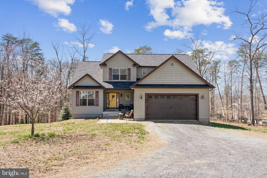 Imagine peaceful country living on 2 acres! This beautiful 4-bedroom, 3.5-bath home offers a main-level primary suite, a 2-car garage, and a fully finished walk-out basement perfect for entertaining. Enjoy the best of both worlds: serene privacy and the nostalgic charm of a nearby turn-of-the-century town, where you can indulge in ice cream shakes at the local pharmacy!