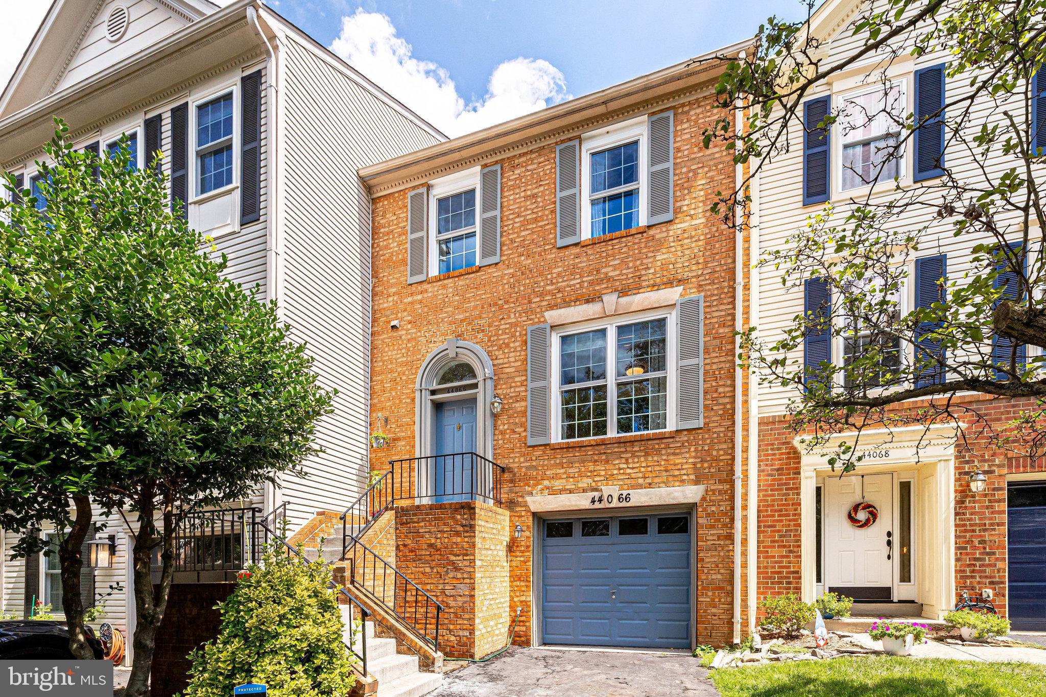 Now Available for Lease! Don't miss the chance to rent this beautifully upgraded brick-front townhouse in sought-after Ashburn Village.
This well-maintained home offers an inviting open floor plan and beautiful LVP floors. The eat-in kitchen offers ample storage with two pantries, while the light-filled living room leads through double French doors to a spacious deck overlooking serene greenery.
Downstairs, a cozy gathering room features a wood-burning fireplace—perfect for cooler nights. In warmer weather, step outside to the brick patio for entertaining or take advantage of direct access to scenic walking trails.
The vaulted-ceiling master bedroom boasts a full wall of closets, and the upgraded master bath features a double vanity, new soaking tub, and separate shower. Two additional bedrooms, a hall bath, and a spacious linen closet complete the upper level. The home can be offered partially furnished with the bed, nightstands, and desk in the primay. As well as, the beds in secondary bedrooms.
Enjoy all the top-tier amenities Ashburn Village has to offer, including a Sports Pavilion, indoor/outdoor pools, fitness center, trails, basketball & tennis courts, soccer & baseball fields, lakes, tot lots, snow removal, and more! Plus, the home is ideally located near Route 7 and premier shopping, dining, and entertainment—including Dulles Town Center, Top Golf, iFLY, movie theaters, and more!