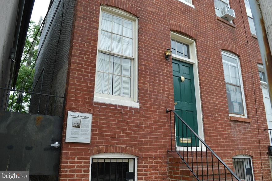 In Fells Point, this EOG has a wide open layout on the first floor & 9'ceiling height. Kitchen offers oak cabinets & ceramic floor and S/S appliances.  One BR & den and Full Bath on the 2nd. Bsmt is about 6' deep/ for laundry, utilities & storage plus bath rough in too. 20 yr rubber roof & Elec breaker box installed June 2015. Recent upgrades in bath, including ceramic flooring. Offered "AS IS".