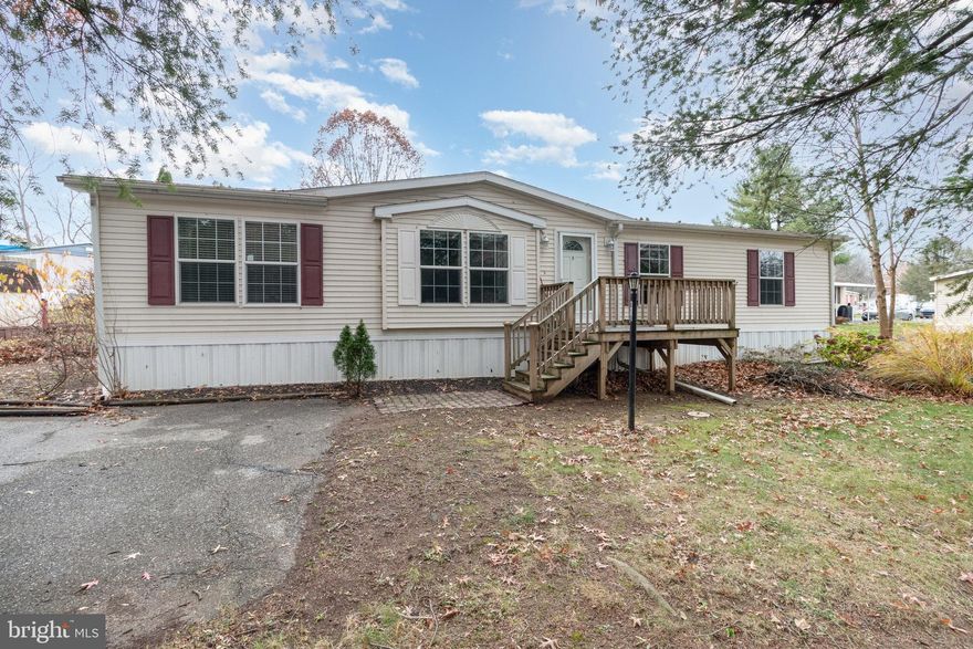 Don’t miss this fantastic opportunity!
This well-maintained double-wide home in Hampden Village MHP, located in the desirable Cumberland Valley School District, offers comfort, privacy, and plenty of space. Tucked away at the end of the drive, the home provides a quiet setting while still being close to all local conveniences. Inside, you’ll find 3 bedrooms, 2 full bathrooms, and an open floor plan that seamlessly connects the kitchen, dining area, and living room—perfect for everyday living and entertaining. Each bedroom features walk-in closets, giving you abundant storage. The spacious laundry room includes additional cabinetry for even more organization. Outside, enjoy the large rear yard, complete with shade trees and a generously sized storage shed. Only steps away from enjoying kayaking on the Conodoguinet Creek as well! This home has been lovingly cared for—come take a look and see all it has to offer!