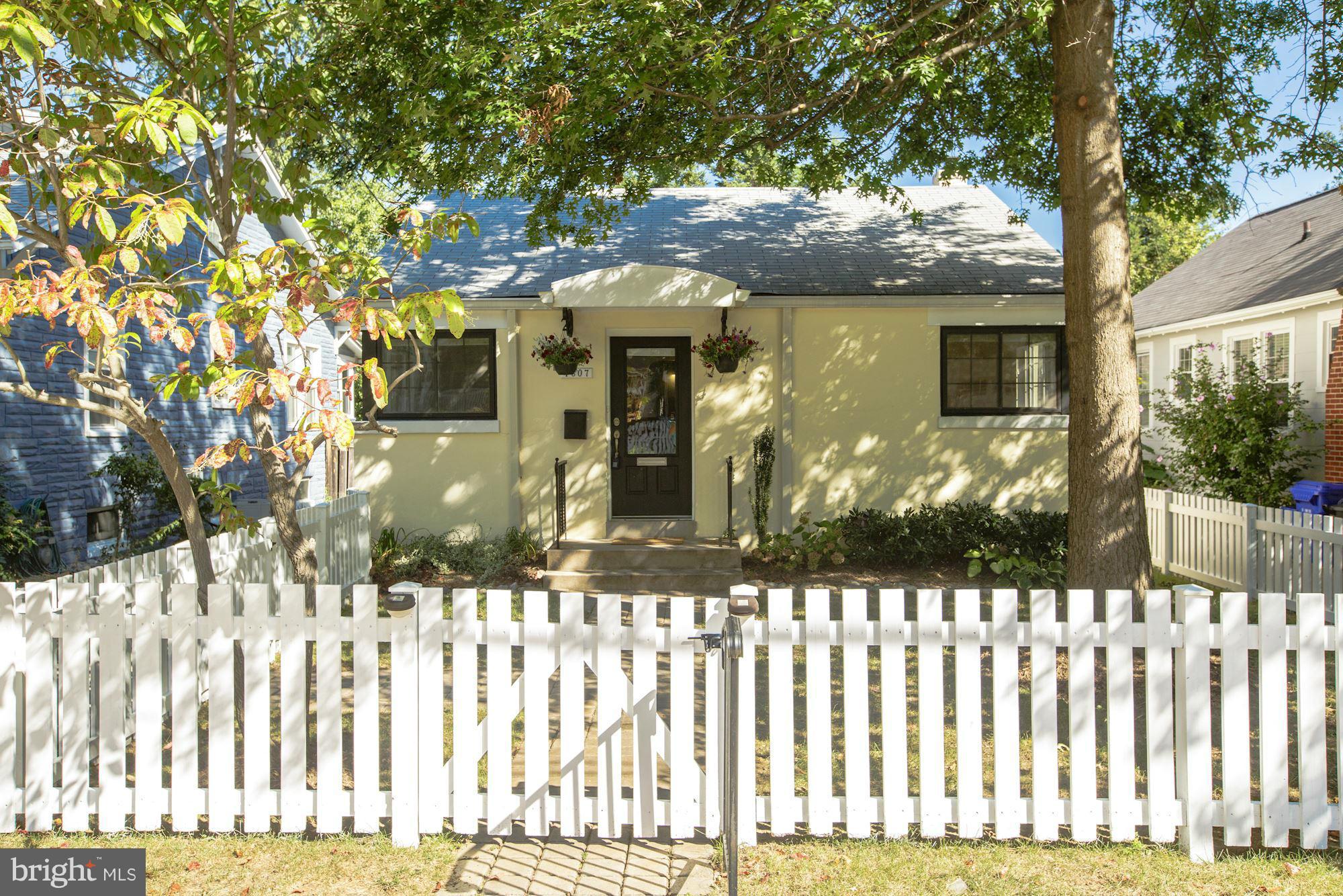 **OFFERS DUE SAT 9/17 5PM**THE ONE YOU HAVE WAITED ALL YEAR FOR! Pretty as a picture- Charming x 10! White picket fence, new windows, newer systems, original raised panel doors, arch detailing, over the top master suite with WIC,1600 sf on 2 lvls, recessed lighting, built ins, pocket doors, flat lot, deck via sunny kitchen, gorg hardwoods on main , brand new carpet in gorgeous basement