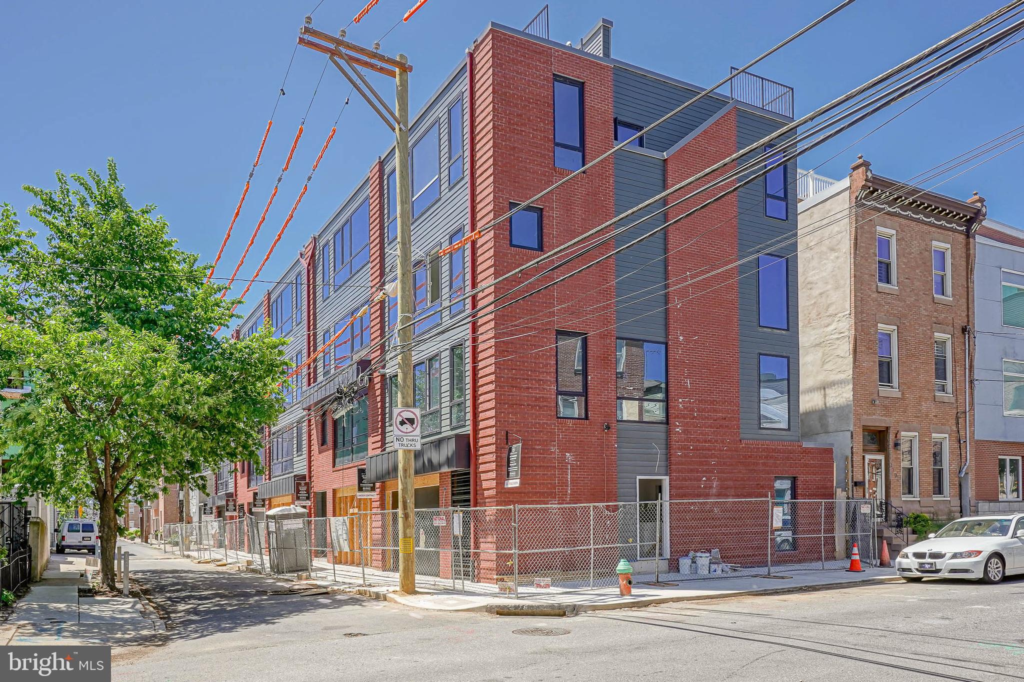 ** LOT 2 and LOT 5 have been SOLD prior to completion ** Only 3 UNITS LEFT ** Ask for the link to the CINEMATIC VIDEO TOUR and information on plans & finishes ** Introducing 5 extravagant new construction homes, located on a quaint street , right in the heart of Fishtown. Nestled in the well-renowned Alexander Adaire Elementary School Catchment. These homes are available in 2 DISTINCT SIZES (prices vary). Enticing 10 YEAR TAX ABATEMENT is included. Featuring 1 CAR GARAGE with the option to convert into a 2 CAR GARAGE (Contact us for details. Price may vary). Schedule a showing while you still have the ability to customize. Savor the wealth of restaurants, bars, cafes, lounges, shops, gyms and the entertainment of Frankford Avenue. Take a quick walk over to the waterfront for parks and entertainment. Quick walk to enjoy even more restaurants and entertainment in Northern Liberties and Old Kensington. For transportation: In close proximity to Highway 95, Ben Franklin Bridge, Betsy Ross Bridge, Philadelphia International Airport and the Market-Frankford Blue Line (to Old City, Center City, 30th Street Station, University City, West Philly and Northeast Philly). The privacy gate (option), favorable for securing packages, greets you inside a thoughtfully designed space featuring an organized storage system, garage access, a spacious bedroom, and a breezeway at the rear. The rear bedroom offers guests the comfort of a private suite, complete with an en-suite bathroom. The basement provides additional valuable storage.The second floor showcases an open floor plan tailored for entertaining and relaxation. This level boasts a bright living room, a chef-inspired kitchen, and a dining area seamlessly integrated for convenience and style. Natural light floods every floor through oversized windows, creating an airy and inviting ambiance. The kitchen is a showstopper, equipped with quartz countertops, premium GE Café appliances, sleek cabinetry, and a stunning waterfall island. Sliding glass doors extend the living space to a private rear deck, perfect for indoor-outdoor entertaining, grilling, and al fresco dining right off the kitchen.The third floor features multiple hallway closets, a convenient laundry room, and two well-appointed bedrooms, each with custom-organized closets and en-suite bathrooms. These bathrooms are luxuriously finished with elegant tilework, modern vanities, soaking tubs, and walk-in showers. The laundry room accommodates a full-size washer and dryer, a utility sink, and additional storage.On the fourth floor, your grand suite awaits. This level includes a versatile den, ideal for use as an office, nursery, gym, or storage, with the option to add a wet bar conveniently located near the roof deck entrance. The primary bedroom offers a spacious walk-in closet, an additional large closet, and a plush en-suite bathroom. The bathroom is a spa-like retreat, featuring exquisite wall-to-wall tilework, dual vanities, a glass-enclosed shower, a soaking tub, and a private water closet. Cap off your experience by entertaining on the expansive roof deck, complete with breathtaking, unobstructed views of the Center City skyline from every angle—a true showstopper for any occasion. Buyers are responsible for verifying taxes and square footage.