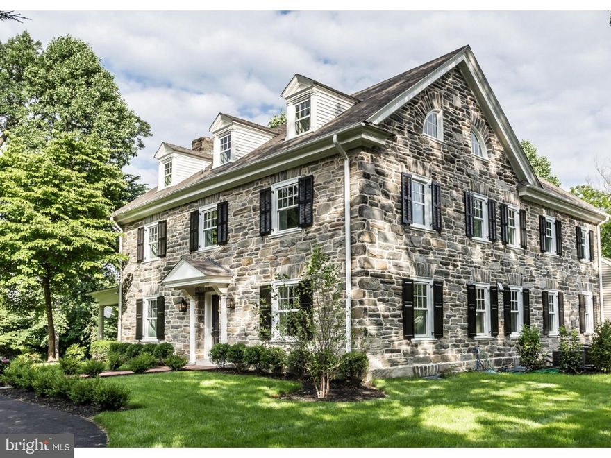 This classic Main Line 3 story center hall colonial home built in 1912 has been completely renovated and restored in 2018 by architect Tom Hall.  It features new:  Kitchen, Baths, HVAC, plumbing and electrical systems, insulated windows, and a completely new interior professionally redesigned to meet today's lifestyle.  The residence sits on just over an acre on one of the most beautiful streets in Villanova.  Once on this private lane, you are struck by the curb appeal of the home, the mature plantings and the circular driveway, that leads to a striking Center Hall entrance.  The Great Room with a classic fireplace is just right for large gatherings and features French doors that open onto a covered brick patio that overlooks a private side yard and a beautiful pool setting. The formal Dining Room leads to a beautiful kitchen complete with Thermador appliances, two dishwashers, a wine fridge, and quartz countertops, and overlooks the fireside Family Room. A classically turned staircase takes you to the 2nd floor which is highlighted by the Master Bedroom Suite with a new marble bath, an oversized shower, a large soaking tub, and two walk-in closets. Two spacious en-suite bedrooms, a generous 2nd floor Laundry with folding/ironing station, and many storage options complete this floor. The 3rd floor enjoys two additional family Bedrooms and a full Bath. Step outside to a park-like setting with a garden area, large sprawling open lawns and peaceful privacy. A second driveway affords overflow parking and leads to a large oversized two car garage. This is the total package! The best location and the charm of yesterday's classic stone homes; the community enjoys a dedicated crosswalk to a wonderful walking path. This beautiful home, ideally located in the estate area of northside Villanova is just minutes from highly respected schools, walking distance to 2 train stations and offers the best of both Town and Country with easy access to all major transportation routes and everything that Suburban Philadelphia has to offer.