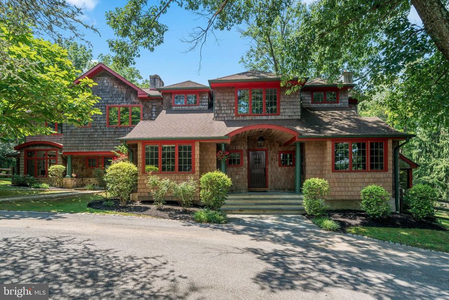 228 Berkeley Road, Inspired by the natural lands and enhanced over the years, this cedar shake cottage style home is sited on a premium, private 1.2 acre home site in the Heart of Devon. The home is comprised of a number of detail oriented rooms, architecturally sophisticated yet casual, inviting and flexible. Hallmarks of this homestead include; blue stone covered front entry porch, custom cherry study with built in desk and bookcase. Striking fireside living room with curved wall of windows and views of the sprawling lush yard. Dining Room with tray ceiling, Custom Chefs Kitchen with 2 farm sinks, marble countertops, commercial grade appliances and walk in pantry. French doors lead to an oversized Travertine terrace with towering stone water fall wall and raised hearth stone fireplace perfect for everyday enjoyment, dining Al Fresco or iced tea after tennis on the popular sport court. The breakfast room with stone fireplace offers its own unique ambiance. Adjacent the morning room is the Great Room, voluminous in size a natural light with walls of windows and doors opening to numerous terraces and a covered porch. The main floor has an In-Law/Guest Suite or even Master Bedroom given the tremendous size and en-suite bath, high ceilings and french door to covered porch. Completing the main floor is a well organized mudroom with buit-ins, walk in closet and a main floor powder room. The second level offers a Master Bedroom with newer marble bath, relaxation shower, ball and claw stand alone tub, custom vanity and sinks, walk in closet and wonderful views flooded with natural light. Cozy Loft area with custom tiles, 3 additional generous sized bedrooms, one en-suite the other two serviced by a newer Jack and Jill bath. The second floor laundry and back staircase completes this level of the home. The lower level offers a media/play room, exercise room, additional flex space and storage as well as a play house built in under the staircase. All this in a "walk to location", within the Highly Regarded T/E school district and everything the Main Line has to offer! This one of a kind home is ready for the next lucky homeowner!