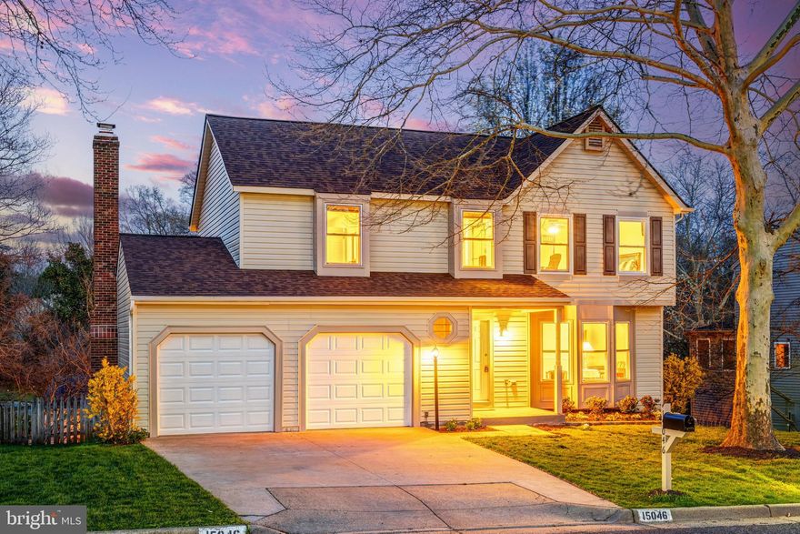 15046 Camellia Lane offers the kind of space, layout, and community that buyers are always hoping to find but rarely get all in one place. Set in Montclair, one of Dumfries’ most loved neighborhoods, this home gives you nearly 2,700 square feet across three finished levels, a true two car garage, four spacious bedrooms upstairs, and 3.5 baths, with the flexibility of a finished walkout lower level that could easily serve as future guest space, office space, gym space, or a fifth bedroom if needed. The main level feels both functional and welcoming, with new neutral LVP flooring, a large formal living room with a bay window, a separate dining room just off the kitchen, and an updated kitchen that buyers will actually appreciate for everyday living, complete with white shaker cabinets, soft close drawers, granite counters, stainless steel appliances, a pantry, and an open connection to the family room so no one feels cut off. The family room brings warmth and character with its whitewashed brick wood burning fireplace, while the oversized sliding door fills the space with natural light and opens to a large deck that expands your living space outdoors. Upstairs, all four bedrooms are generously sized, which is getting harder and harder to find, and the primary suite delivers the features that matter most with a walk in closet and an updated bath featuring dual vanities with granite tops, contemporary tile, and a beautifully redone shower. The secondary bath has also been nicely updated with matching finishes, so the home feels consistent and well cared for throughout. The lower level has been recently redone with the same neutral flooring carried through from the main level, plus a full bath with modern tile, a white shaker vanity with marble top, and a stand up shower with marble surround, giving buyers extra finished space that can adapt as life changes. Big ticket updates are already handled with a new roof in 2025, windows in 2021, new electrical panel 2022, HVAC in 2026, heat pump 2020, siding and exterior trim 2023, garage doors 2023, and water heater in 2019, which matters because buyers want to move in and enjoy a home, not inherit a to do list. And then there is Montclair, which is a huge part of the story here. This is not just a neighborhood, it is a lifestyle centered around a stocked lake with three sandy beaches, fishing piers, trails, playgrounds, sports fields, tennis and basketball courts, a dog park, and year round community events, with golf and pool memberships also available through the country club. Add in top rated Prince William County schools, nearby shopping, restaurants, library access, commuter routes to I-95, Route 234, Route 1, Quantico, the Pentagon, and DC, and you have a home that gives buyers the space they need, the updates they want, and a community they will genuinely enjoy being part of.