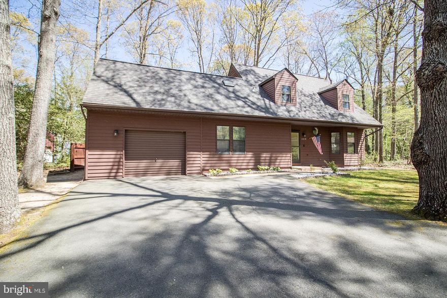 Dreaming of a new home this Spring....well here it is!  This cape cod home includes 3 bedrooms and 2 full bathrooms.  The covered entryway provides protection from the elements when entering and existing the home.   The foyer leads you into the living room and dining room with chair railing.   The flooring on the main level is new within the last 2 years.  The updated kitchen includes stainless appliances and a bay window with space for a small table.   The first floor has a full bath which has been updated and a main level bedroom.   Laundry access is located on the main floor along with access to the garage.   The second level includes 2 additional bedrooms, a full bathroom and a bonus room.  The bonus room is located just off one of the bedrooms and can be used to create space for a home office, craft area, workout room, game room  or just a fun hideaway with built in storage.  The fully fenced backyard has a patio area to relax and enjoy the outdoor space.  Close to schools, shopping, and area amenities.  Schedule your online appointment today.