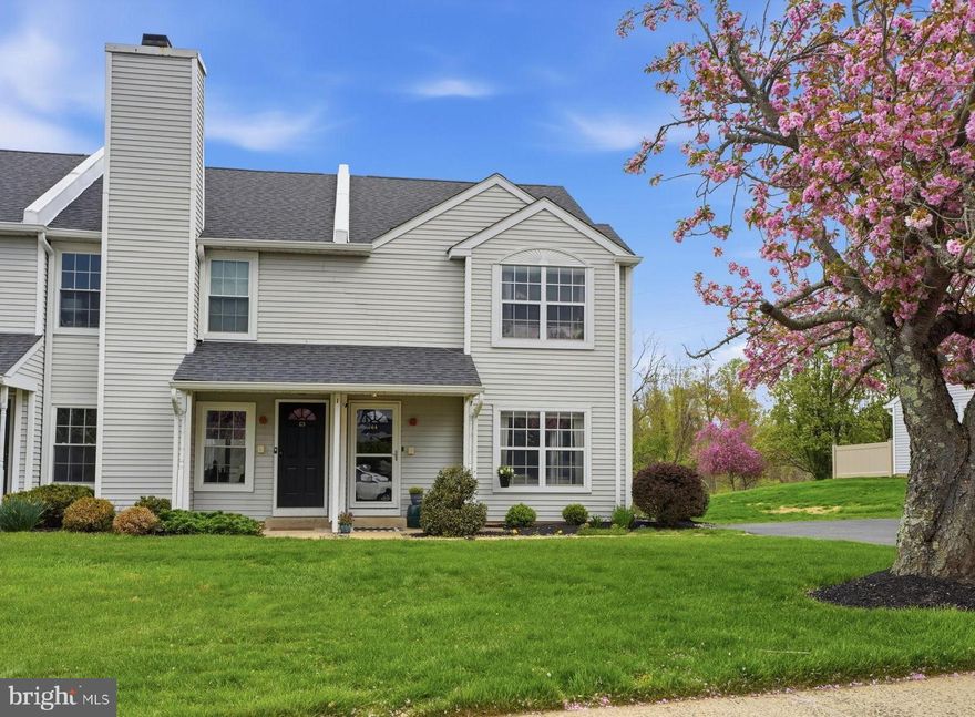Welcome home to this beautifully maintained, lovingly cared-for end-unit townhome in the desirable Country Bend community, located within the award-winning Council Rock School District! Offering comfort, convenience, and low-maintenance living, this spacious home features two generously sized bedrooms, each with its own private full bathroom, plus a convenient half bath on the main level. The first floor offers an open, inviting layout with a bright living and dining area that flows seamlessly into the kitchen. Just off the kitchen, you’ll find a laundry room and sliding glass doors leading to a private, fenced-in patio which is perfect for relaxing or entertaining. Upstairs, both bedrooms provide ample space and privacy, along with additional storage accessible via pull-down attic steps. Enjoy peaceful surroundings with a private backyard that borders open space and offers scenic sunset views over the cul-de-sac. The HOA & Condo associations add exceptional value by covering lawn and tree care, roof, siding, fencing, snow removal, trash service, tennis courts, and more, ensuring truly care-free living. Ideally located near walking trails, parks, and schools, and just minutes from Newtown Borough, shopping, dining, libraries, and I-95 for easy commuting!