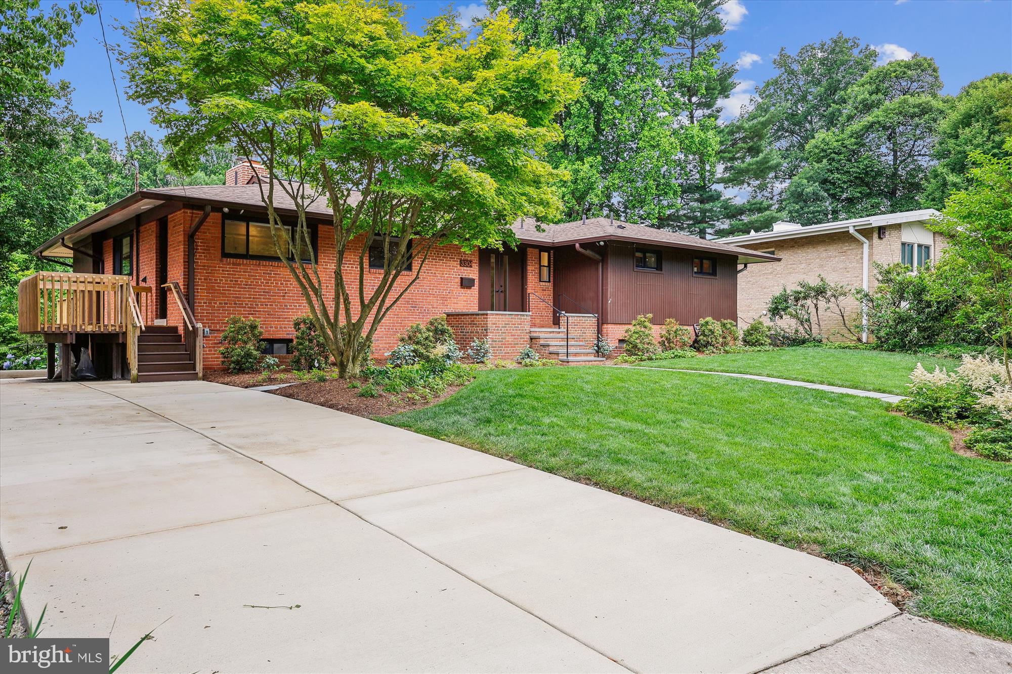3BR/3.5BA contemporary rambler in Chevy Chase's Dunlop Hills/Rollingwood Neighborhood. Nestled on a quiet cul-de-sac, this spacious rambler sits on a generous 10,000+ SF lot. Updates include: all new windows & doors, new basement flooring, new patio & deck. Newly refinished hardwood floors on main level, fireplace in living room, spacious kitchen w/ adjacent laundry area, w/ new oversized capacity washer, sunroom off of dining area & convenient half bathroom off hallway. Large primary BR suite w/ abundant closet space & built-ins; the 2nd BR has an ensuite bathroom. Ceiling fans in the main level BRs & sunroom. The lower level features a 3rd BR & a hall full bathroom, a large recreation room w/ fireplace & entertainment bar, a den area w/ built-ins, great for office or play area; & plenty of storage space. The walk-out lower level opens to an expansive patio w/ beautiful hardscape & gorgeous landscaped yard. Enjoy the evenings outdoors w/ the propane patio heater, exterior lights & some outdoor furniture. Perfect entertaining & al fresco dining w/ the deck, patio, & landscaped yard. Sought after location; very close to downtown Bethesda, near Candy Cane Park, Rock Creek Park, Norman's Farmers Market, & Brookville shops. Located in the BCC Cluster - Chevy Chase ES, Silver Creek MS & Bethesda-Chevy Chase HS. Rent includes all lawn maintenance.
