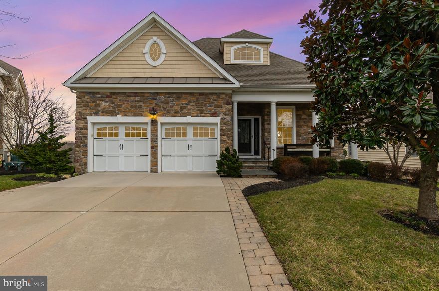 Welcome to 111 Tim Tam Court. One of the most prestigious locations in Bulle Rock. Enjoy the life of luxury with panoramic views of the Chesapeake from your custom enclosed deck and stone patio.  This gated golf course community is revered for it's world class community center which happens to be directly across the street. This awesome home is a Clark Turner model in very good condition and loaded with nice amenities and many upgrades: 15 ft arched ceiling over the kitchen and family room with hardwoods, amazing custom mural, beautiful trim, recessed and accent lighting. Custom gourmet kitchen with quartz counters, soft close Wellborn cabinetry and top of the line Jenn Aire hood and appliances. Two sided gas fireplace. Huge primary master suite with deck access, large walk in closet with custom shelving, heated ceramic floors, private toilet, double vanities, soaking tub and large walk in shower with seat. 2 guest bedrooms and full bath with updated floors, vanity and shower enclosure. Formal dining and sitting rooms feature custom murals and hardwood floors. Large walk in laundry room and painted garage with epoxy floor and super quiet door openers. Level walk out basement is huge, clean and has a 3rd full bath. Anderson windows and custom window treatments throughout... and more. Did I mention the fully owned Shuco Solar System? Call for a complete list of upgrades. Cinch Home Warranty with HVAC Coverage included. Only minutes from beautiful down town Havre de Grace where you can walk the promenade or enjoy dining and shopping. Close to I-95, APG, MARC &  AMTRAK trains, schools and shopping. Don't miss this chance to get one of the best in Bulle Rock!