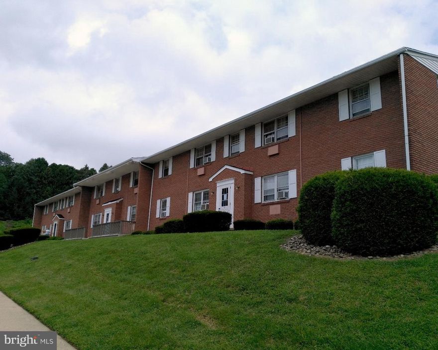 First Floor apartment at Orchard Hills Apartments - Boyertown School District Available Now!  Smoke free, pet free apartment features 2 bedrooms, 1 bath on 1st floor with small patio! Apartment includes refrigerator, range/oven, dishwasher & wall unit A/C in living room. On sight coin operated laundry with available storage in basement of building.  Tenant pays quarterly water/sewer, electric, phone, cable, etc.  Sorry, NO PETS/ANIMALS allowed.