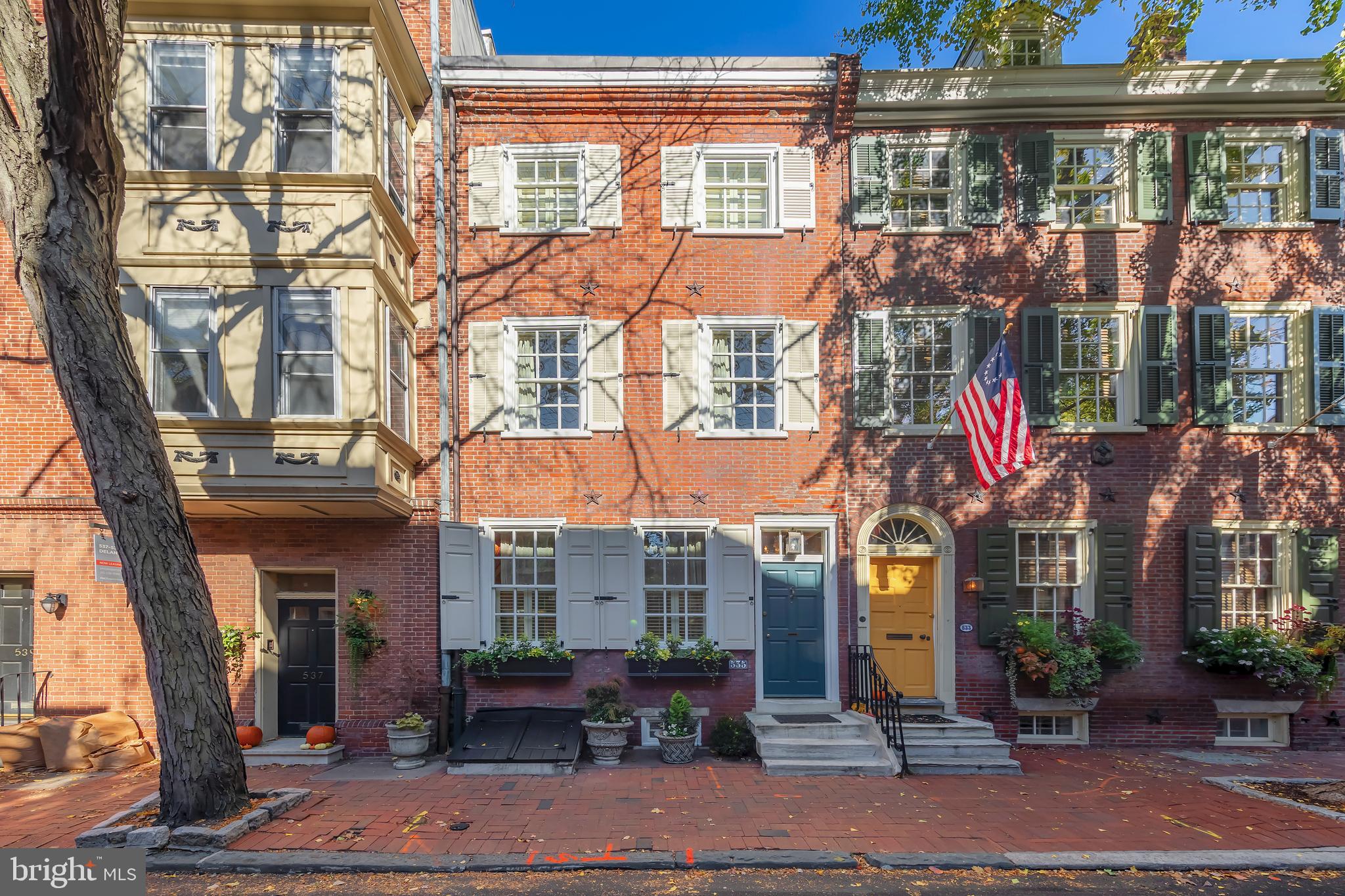 Beautiful historic home built in 1802 in the heart of Society Hill has 4 bedrooms, 3 full baths, beautiful wood floors & heated marble floors thru out the 5 levels of living space, a lovely deck great for entertaining, wainscoting on several levels and freshly painted on the outside exterior. The front windows were replaced with windows that comply with the historic registry. This lovely home is move in ready condition and has an amazing kitchen with limestone countertop island, La Cornue range, double ovens, charcoal grill plus built in La Cornue cabinets for storage. The French doors were replaced with upgraded doors and the seller added retractable screens. The home was recently re-roofed with new shingles on the front roof, new flashing on the party wall, and re-coating of the flat roof in rear. They installed trex flooring on the rear deck. The seller has replaced the hot water heater, humidifier, refrigerator recently. All toilets were replaced with upgraded fixtures, the master bath is huge with a large shower, tub, double high vanity, heated towel rack & marble floor. There is an annual service contract for the HVAC which is paid for through the 2024-2025 season, annual termite warranty and alarm contract all paid for through 2025. The sun shines all day long in this beautiful home because of all the natural light coming through a truly lovely home you don’t want to miss.