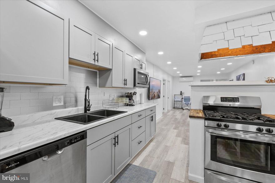 Turnkey, fully renovated, and perfectly positioned in West Ocean City—this one checks every box.This fully renovated 5-bedroom, 2-bath home has been thoughtfully updated from top to bottom and is ready for immediate enjoyment or investment. Improvements include added bedrooms, updated siding and window trim, a refreshed kitchen, upgraded electrical and plumbing, renovated bathrooms, new flooring, added closet space, interior A/C units, new furnishings and TVs, and fresh paint throughout—every detail has been addressed. Enjoy outdoor living with a shaded front deck plus additional rear decking, offering multiple spaces to relax or entertain. Tucked away at the back of Delmarva Park, this home offers a quiet setting while still being moments from everything Ocean City and West Ocean City have to offer. Boaters will love the proximity to the West Ocean City fishing harbor—with room to store a boat on the property—while beachgoers and commuters will appreciate the nearby Park & Ride just steps away. A rare combination of privacy, convenience, and move-in-ready condition makes this property a standout opportunity.