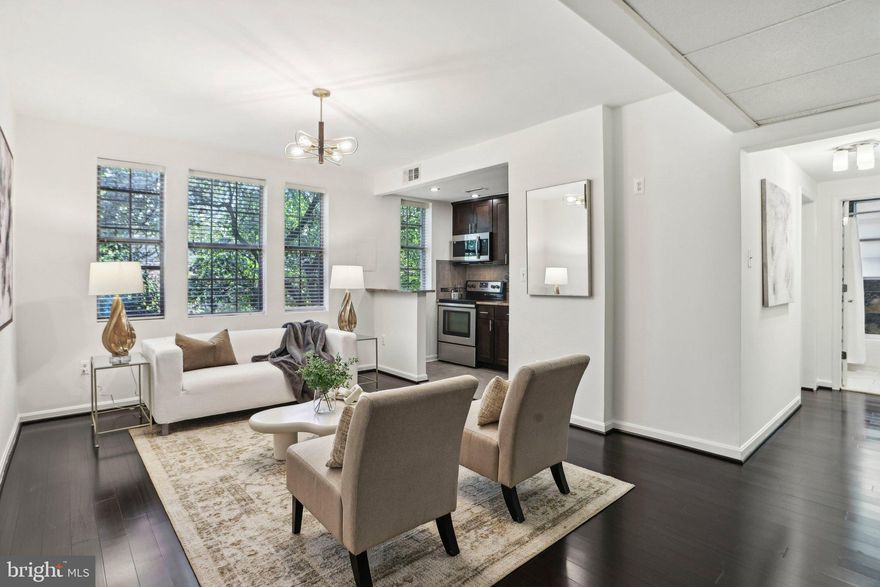 Welcome to this beautifully updated one-bedroom condo located in the heart of Colonial Village—voted the #1 place to live in 2024 by Niche! This home is the perfect commuter location, walkable within minutes to the Rosslyn and Courthouse Metros. 

This inviting home features fresh interior paint, hardwood floors throughout, and a thoughtfully modernized layout that blends charm with functionality.

The kitchen has been opened up to create a seamless flow into the dining and living areas, making the space feel open and connected—perfect for both everyday living and entertaining. It’s equipped with stainless steel appliances, including a brand-new microwave. The living room overlooks a tranquil courtyard, offering a peaceful view.

The generously sized bedroom provides a quiet retreat with a walk-in closet, while the adjacent bathroom is clean, bright, and modern.

What really sets this home apart is its location within Colonial Village I, which offers the rare privilege of a parking lot directly behind the building—a highly sought-after perk in this area.

Additional features include a designated storage room in Building 1801 (#136) just across the courtyard—perfect for bikes, seasonal items, or extra belongings. Colonial Village is also pet-friendly, making it a great fit for animal lovers.

Outdoor enthusiasts will love being just blocks from biking and running trails near Key Bridge, with connections to the Custis and Mt. Vernon Trails, and only one mile from the scenic beauty of Theodore Roosevelt Island. 2 miles from Georgetown and its waterfront, and 3 miles to the National Mall.

Shops, restaurants, and vibrant local nightlife in the Courthouse/Clarendon corridor are all within reach. With its unbeatable location and smart updates, this condo is the perfect place to call home.