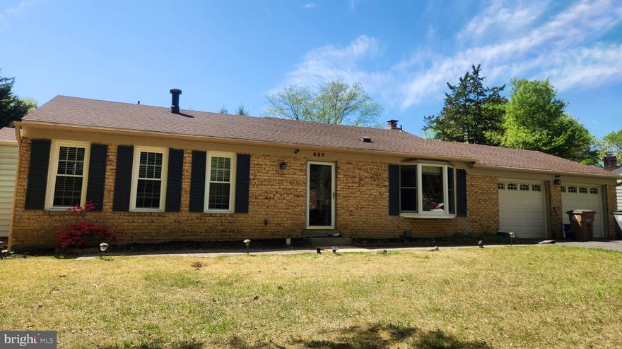 Spacious 4-bedroom, 3-bath rancher located in Potomac's  highly sought-after Fallsmead community, offering the ease of main-level living with thoughtful updates throughout.  Fresh paint and newly installed hardwood flooring enhance all main-level bedrooms, while the sun-filled open floor plan showcases recently refinished hardwoods, recessed lighting, and a soothing neutral palette. The dining room features sliding door access to the backyard for seamless indoor-outdoor living.The kitchen includes a breakfast nook with a newer bay window, wood cabinetry, sleek black granite countertops, stainless steel appliances, and a built-in microwave.  The primary bedroom features newly installed hardwood flooring and an updated private en suite bath with a dual vanity and decorative tile inlay, while two additional bedrooms with new hardwoods and a hall bath complete the main level. The walkout lower level expands the living space with a generous family room anchored by a wall-to-wall brick wood-burning fireplace, an additional bedroom, a full bath, a bonus room, and a large storage with laundry area and additional access to the backyard.   Enjoy outdoor living on the beautifully landscaped premium lot, along with the convenience of a spacious two-car garage. Ideally located near major commuter routes, shopping, dining, and entertainment options