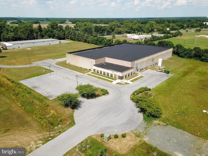 Manufacturing Facility for Sale or Lease.
60,000 square feet total - 22,500 SF of fully conditioned manufacturing space ( clean rooms and all support systems are remaining in place. Two rooms are full-fledged clean rooms, and one room is a white room).  5,271 SF of very attractive office space offering executive offices, administrative areas, bull pen area, conference room and cafeteria.  17,699 SF heated warehouse space.  30' ceilings.    Fully sprinklered - Heavy electrical power.  Large breakroom with lockers and multiple restrooms.  
3,500 SF of open mezzanine space.  Public utilities - 2 Docks - 1 Drive-in.  Great parking for employees and tractor trailers.
City of Seaford is the electrical provider.  Owner would like to leaseback 14,500 SF of warehouse space.