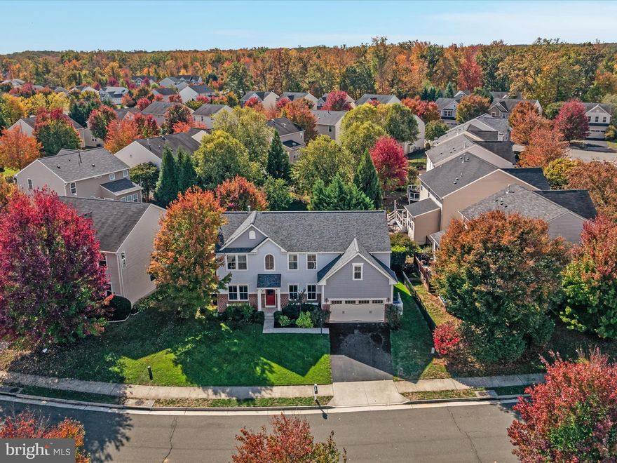 Beautifully maintained FIVE bedroom Ravenna Model in sought after Brookside Community. Main level features open floor plan kitchen and family room, office, formal dining and living room with a sun-drenched gourmet kitchen with updated cabinets, large island, and backsplash. The upper level boasts 5 spacious bedrooms, featuring the perfect primary suite. The basement has a large entertaining room, full bathroom, and potential sixth bedroom/media room. Custom stamped concrete patio with built in fire pit, fully fenced back yard! Radon remediation system already in place. New roof as of 7/2023 Come for the house, stay for the amenities! Walking distance to the community dock access, lakeside pool, basketball courts, tennis courts and 2 playgrounds. Enjoy the 7 miles of park like walking trails encompassing the community. Immerse yourself in the growing local businesses and local community theatre! All with in 2 miles of the house!