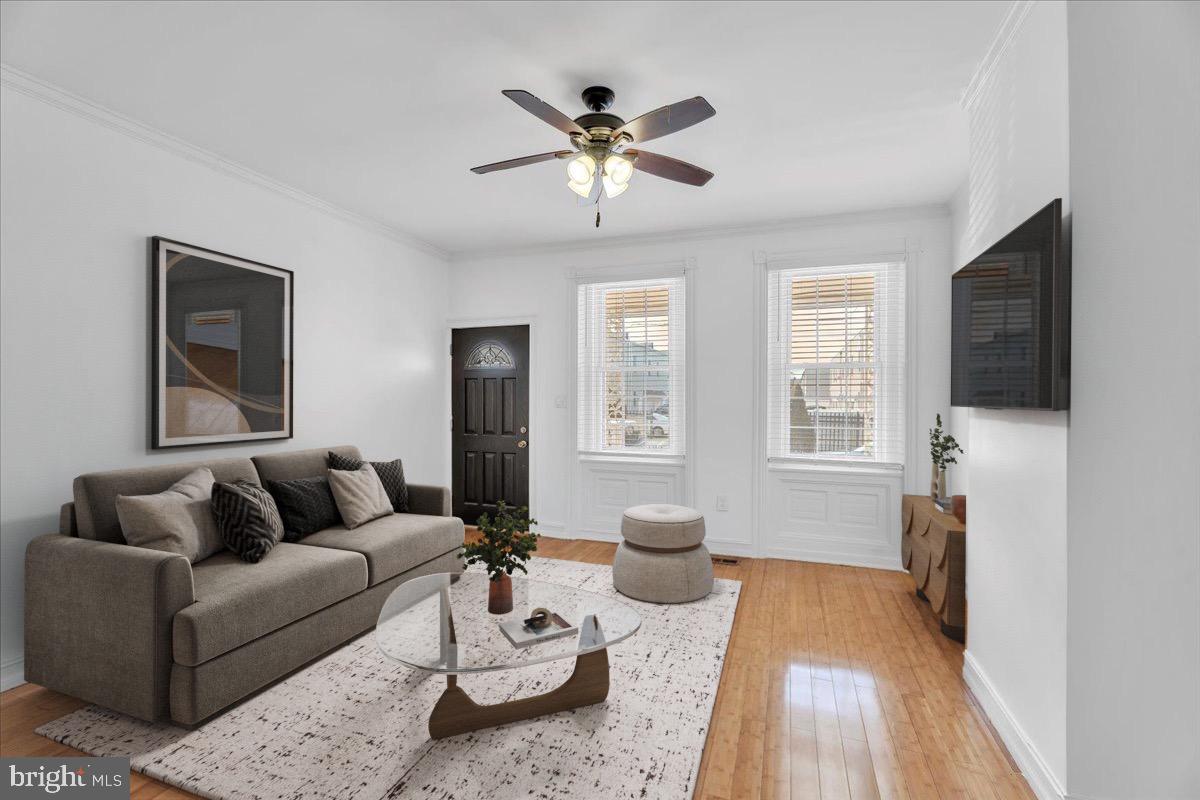 Welcome to 2557 E Indiana Ave, a beautifully maintained 3-bedroom, 2-bathroom home in the heart of Port Richmond, one of Philadelphia’s most vibrant and historic neighborhoods. As you step inside, you'll be greeted by a bright and open floor plan with gleaming hardwood floors throughout. The sunlit living room flows effortlessly into the dining area, creating a warm and inviting space for entertaining. The galley-style kitchen is both stylish and functional, featuring ample cabinet space, a built-in wine rack, granite countertops, stainless steel appliances, and a tiled accent wall for added character. Beyond the kitchen, a mudroom and a second full bathroom add extra convenience, while the fully finished, tiled basement offers additional living space and a dedicated laundry room. Upstairs, you'll find three spacious bedrooms, all with hardwood flooring and generous closet space, along with a well-appointed full bathroom. Outside, the quaint, fenced-in rear yard provides a cozy spot for outdoor relaxation, gardening, or entertaining. This home is ideally situated in Port Richmond, a neighborhood known for its thriving local scene and community feel. Just around the corner on Gaul St., you’ll find popular dining spots like Nemi Restaurant, known for its contemporary Mexican cuisine, and Byrne’s Tavern, a longtime favorite for its welcoming atmosphere and delicious fare. Campbell Square Park is also nearby, offering a peaceful green space for recreation and community events. With easy access to I-95, commuting to Center City and beyond is a breeze, and SEPTA bus routes provide additional transportation options. Don't miss your chance to call this Port Richmond gem your new home—schedule a showing today!