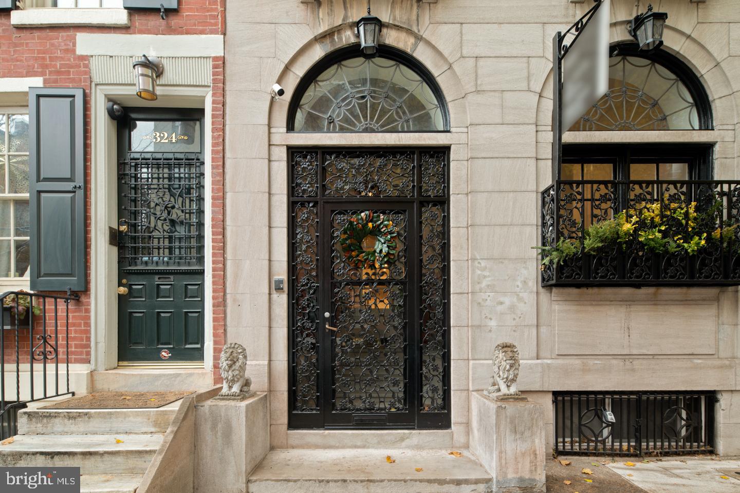 Amazing renovation in a Parisian Rittenhouse Square townhouse. Built in the early 19th century this 3,000 sq ft home is adorned in outstanding original details complemented by the exquisite modern renovations that have been completed throughout. An elegant facade greets you with lovely Juliette balconies and marble stonework. Enter into a marble-clad foyer which opens into a pleasant great room with 10' ceilings, beautiful mouldings, leaded glass windows, hardwood floors, and a stone wood-burning fireplace. Off the living room is a vestibule with a powder room and wet bar with black stone countertops and a wine fridge. This leads you into the first bedroom suite with walk in closets and beautifully renovated full bath. This room may also be used as an entertainment space, office, or library. Climb the original English staircase to the second level where an immense, sun-splashed living room, floor to ceiling windows and with a second wood-burning fireplace with a stunning marble surround awaits you. There is an open dining room, a petite outdoor patio and chef's kitchen making for a superb entertaining experience. The kitchen, which has been completely renovated, is outfitted with top of the line appliances from Wolf and SubZero. The next level features a spacious master suite with built in shelving and natural light from two bright windows. The chic master bath features sleek tile work, a porcelain soaking tub, glass walk-in shower, marble vanity, and stylish brass hardware. This level also has a second bedroom and an additional renovated full bath. The top level is home to the final bedroom suite with another stylish bath and ample storage space. Located in Philadelphia's most captivating neighborhood this residence presents an opportunity for truly lavish living.