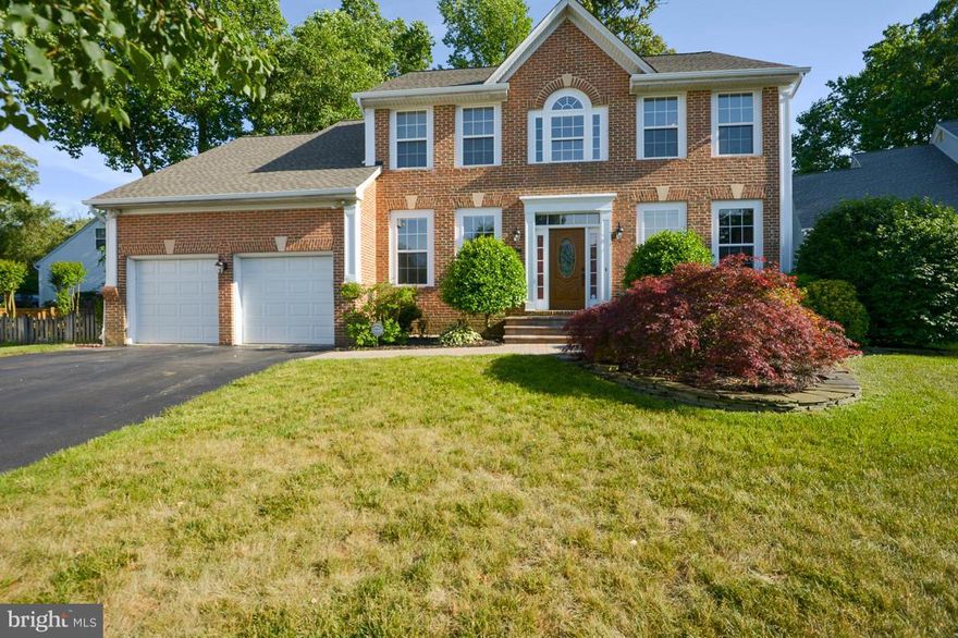 Former Model Home!***Stately Brick-Front Colonial Located In Crofton Triangle/SR School District***Inviting & Spacious Home W/Open Floor Plan, Main Level Office, Gas FP/Stove, SS Appliances, Granite Counters, Island & Custom Back-Splash, Large Master Suite w/Vaulted Ceilings, Welcoming Deck, Brand New Roof/Gutters, Irrigation System, Large Back Yard***Walk to Community Playground ***
