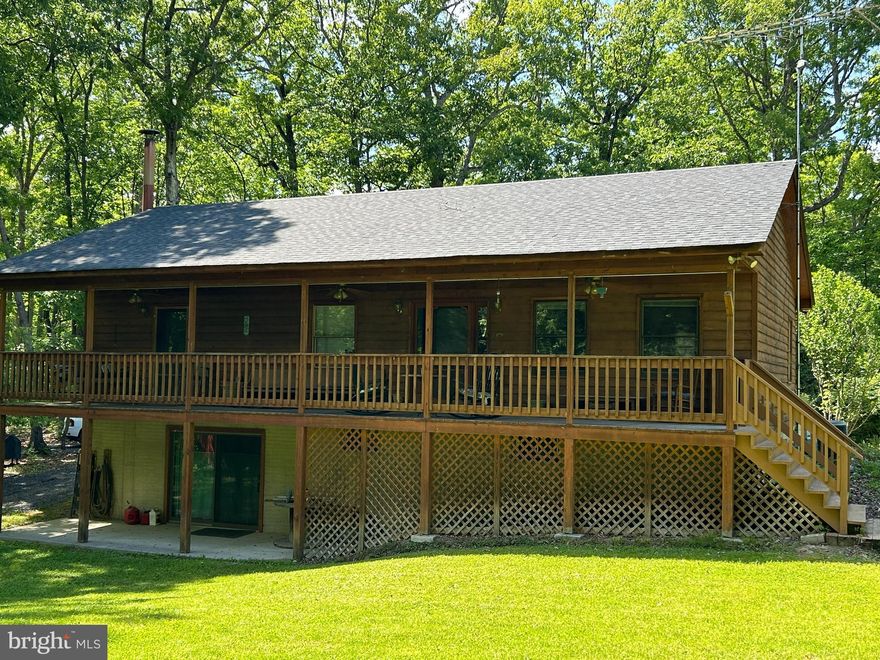 Experience the best of country living with modern comforts. Your dream retreat situated in the heart of nature; whether you seek a vacation getaway or a permanent paradise, this property is your perfect match! Charming cedar ranch offers 2+ acres of land, framed by the Blue Ridge Mountains and Shenandoah River, creating the perfect escape. New roof, New well, Newly graveled driveway and freshly painted interior make this home ready to move in and enjoy. Flat yard for all your family gatherings or a nice evening fire after a day of kayaking and/or fishing. Huge primary bedroom with private bath, nice sized closet and access to porch. Kitchen has plenty of cabinet space and natural light. Beautiful hardwood floors. Fabulous porch running the full length of the home is excellent for that morning coffee or relaxing with a good book. Separate mud/laundry room. Full unfinished walk-out basement with woodstove and a secure locking storage room.  New heat pump installed 2021. Roof 12/25 Well 2/26 **Priced well below tax assessment!** Convenient commuter location and about a mile from the public Shenandoah River access point. Close to National and State Parks, Skyline Drive and the Appalachian Trail – Perfect for Hiking, Wildlife & Endless Outdoor Adventures.