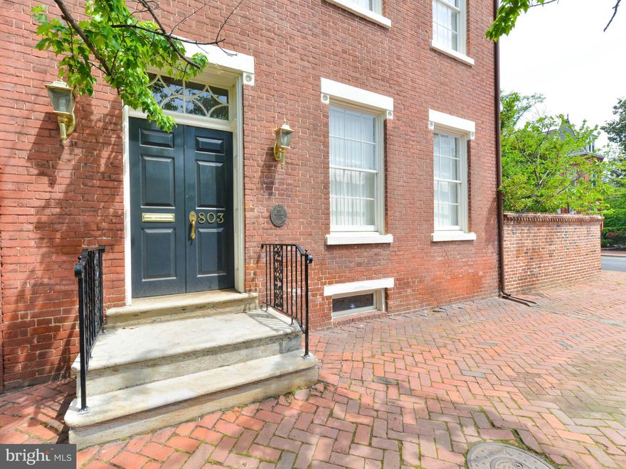 Rare opportunity to own a piece of Alexandria history. Built in 1810 by a wealthy ship captain this elegant property is zoned for commercial/ residential. 10 ft ceilings, original Pine floors, brick walled garden, one block to King Street. Endless possibilities for remarkable property! ENORMOUS GARDEN.Walkable to King St. Metro,1 blK to trolley. Photos from earlier staging. Covered parking avail.