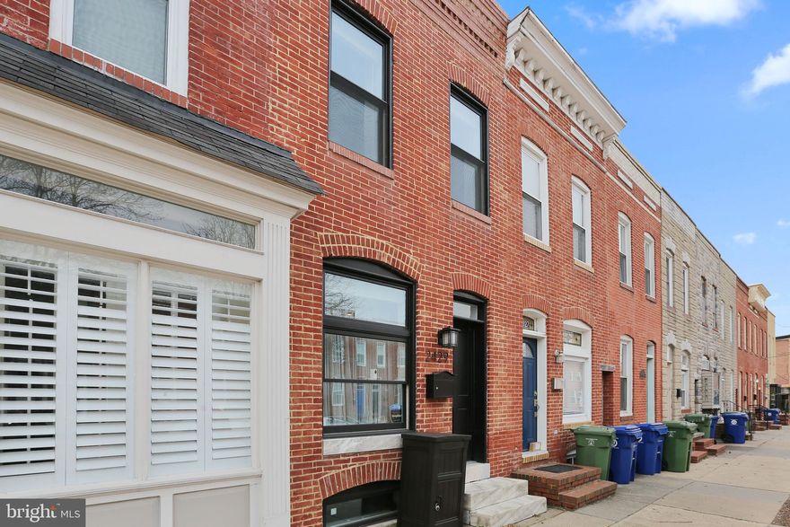 Welcome to this stylish CHAP TAX Renovation with 3 finished levels and a rooftop deck. Fully renovated in 2019, this home has 7-8 years left on the CHAP Tax Credit, saving you thousands. Conveniently located in Canton this home features an open floor plan with hardwood floors throughout, exposed brick, granite counters, stainless steel appliances, a full-size pantry, and a breakfast bar area. The fully finished lower level features a large bedroom and full bath and an additional room perfect for a home gym or office.  Get in before summer and enjoy city views from the rooftop under covered pergola!