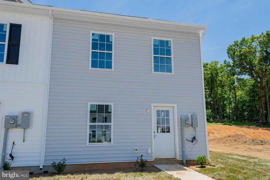 One of the last end units available for this model and its Immediate delivery! The builder is offering 3% in closing cost! This spacious townhouse has 1, 440 square feet of living space. Inside, you'll find a large L-shaped kitchen with plenty of counter space, modern appliances, and storage. The layout connects the kitchen to the dining and living areas, perfect for social gatherings. The family room is bright and inviting with large windows, ideal for relaxing and entertaining. Upstairs, there are three bedrooms. The primary bedroom has an ensuite bathroom, and there are two and a half bathrooms in total for everyone's convenience.