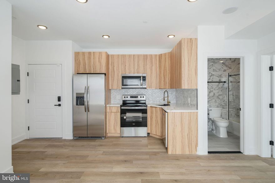 Welcome to 2000 N Front St , a brand new construction 21 unit apartment complex with exceptional build quality. This includes calcutta quartz countertops, stainless steel appliances & sinks, soft close cabinets, electric fireplace & spacious custom closets, floor to ceiling tile bathrooms with LED mirrors. In addition, there are modern upgrades such as an alarm/intercom system, built in speakers, keyless entry/door codes,  an in-unit stackable washer/dryer.. There is an elevator for convenience that takes you to each of the 4 residential floors, a basement that provides storage for your bike and a massive shared roof deck!

This apartment complex is in close proximity to major roadways, public transport & is a stones throw away from some of the best restaurants in Fishtown (LMNO & Kalaya).

Advetised $1350 reflects the Net monthly payment. The gross rent will be $1475 (1 mo free) for a 12 mo lease.

Tenants are responsible for the following utilities: 
Water $50/mo flat fee (subject to change)
Electric (based on usage) 
NO GAS
Internet 

Text the listing agent for video tours!