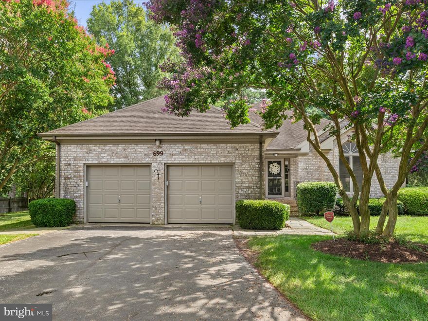 Nestled in the charming community of Village in the Park, this all-brick 3-bedroom, 2-bath rancher offers comfort, convenience, and thoughtful upgrades throughout. Inside, you’ll find an inviting floor plan filled with natural light, starting with newly installed flooring in the foyer and kitchen. The spacious living room features a vaulted ceiling with crown molding, skylights, a masonry gas fireplace, and direct access to the private paved patio, perfect for relaxed indoor-outdoor living.

The eat-in kitchen has been beautifully updated with granite countertops, a stylish backsplash, recessed lighting, upgraded light fixtures, and chair rail detailing. Stainless steel appliances and a casual dining space make it both functional and welcoming, while sliding doors lead directly to the serene screened-in porch. A separate window-filled dining area provides an ideal setting for more formal meals.

The primary bedroom is tucked away for privacy and overlooks the backyard patio. It features a walk-in closet and an en suite bath with tile flooring, a jetted tub, separate shower, double vanity, and skylight. Two additional bedrooms and a second full bath are located on the opposite side of the home.

Additional highlights include a laundry room with washer, dryer, and extra cabinetry, along with a finished 2-car garage. The backyard is fully fenced for added privacy and peace of mind.
The quarterly HOA fee includes water, sewer, trash removal, snow removal, lawn mowing, and irrigation, this home offers easy, low-maintenance living—just minutes from the Salisbury Zoo, Routes 13 and 50, shopping, restaurants, and a short drive to the beach. HOA dues are set to go back down to $700 Quarterly by the end of 2025 after the drive ways are repaved.