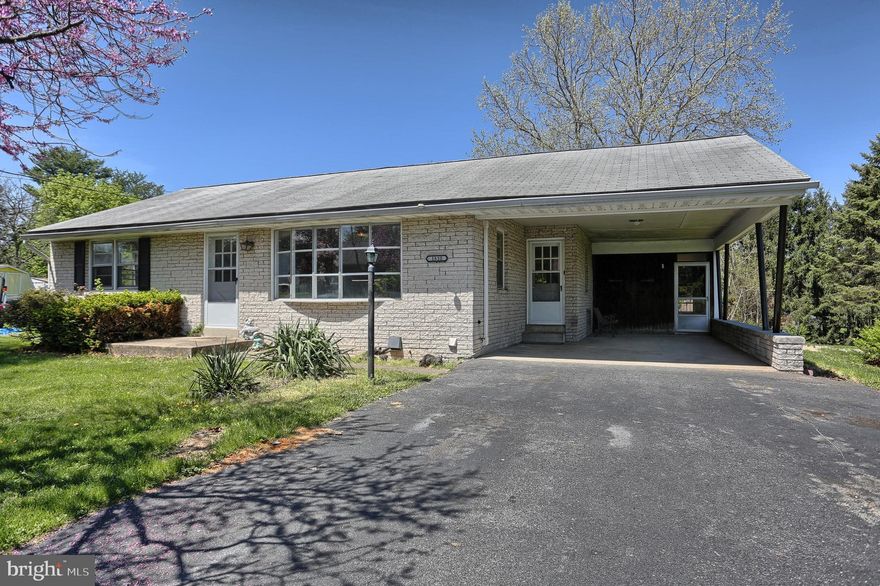 Check out this home in Carlisle! First floor living is at its finest with a great layout that features a great family room off the kitchen, living room with huge windows, access to the sun room and has a wood stove for those chilly evenings. Continue on to the 2 cozy bedrooms, full bathroom and a potential 3rd bedroom as well! As an added bonus to this already fantastic home is a finished walk out lower level makes a great man cave, home office or kid space! Come check it out today!