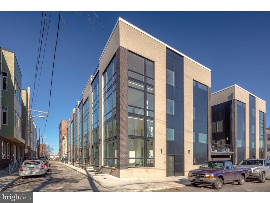 Revolutionary 4-story New construction home at the perfect corner location in Red Hot Olde Kensington located right next to Fishtown and Northern Liberties. Rarely offered full 4-story homes with full floor master suites, garage, roof deck, tax abatement and state of the art finishes usually found in $750,000-$1,000,000+ new homes. The Jefferson Estates homes have unique facades with walls of floor to ceiling windows,Huge kitchens with 3 rows of cabinets/drawers, designer cabinets, upgraded quartz counter tops with granite waterfall feature, tiled back-splashes, and luxury stainless steel appliances including professional vent hood, all standard, also the kitchen has glass sliding doors to a 15' x 10' concrete and steel patio!! The Glass railing system on the 1st and 2nd floor staircase is stunning. The iron railings throughout the rest of the home are top quality and well designed. Wide planks hardwood floors in every room. 2-zones of heating and central air. Double height living room ceiling and every home has a wall of windows that is simply breathtaking. handsome brick facades,designer fixtures in all bathrooms, amazing light fixtures and much more. All three large bedrooms and three full baths are on the upper floors. plus there are two half baths on the first floor and lower level. The full floor master suite has spectacular views, walk in closets, and a bathroom that will make you feel like you are permanently on vacation as you enjoy the oval floating tub, double floating vanity, huge walk in glass shower and sizzling tile selections and finishes. Finished basement!! These homes will rival new homes that are two times their price!! Walk to all of the Fishtown and Nlibs hot spots. Walk to the supermarket and many open green spaces in the area. This is the LAST of 16 homes in this development. The other corner home in Jefferson Estates sold for 670k, 1500 N Hancock, MLS#6999319.