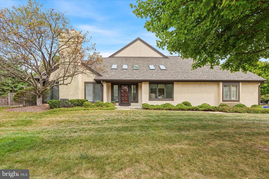 Located in the popular townhome community of Steeplechase in the heart of Blue Bell. This popular end unit is very spacious with a first floor primary Bedroom and bath. Located on a corner lot providing generous common areas surrounding the home. The dining room, foyer and living room all have cathedral ceilings with Skylights in both the foyer and dining room providing an abundance of sunlight. The den, powder room and New kitchen complete the first floor layout. Also on this level is the two car side entry garage with level driveway for four additional cars. The second floor includes two very large bedrooms both with two closets and a hall bath. The basement is unfinished with high ceilings for plenty of storage. The patio off of the living room from the new French doors is a newer trex deck. The fenced in rear area is perfect for your pets or ready for you to create your perennial and annual gardens. Additional features include new living room windows, new kitchen with granite, island and stainless steel appliances, new garage door and opener, new roof and skylights in August 2024. This home is priced with your updating in mind.