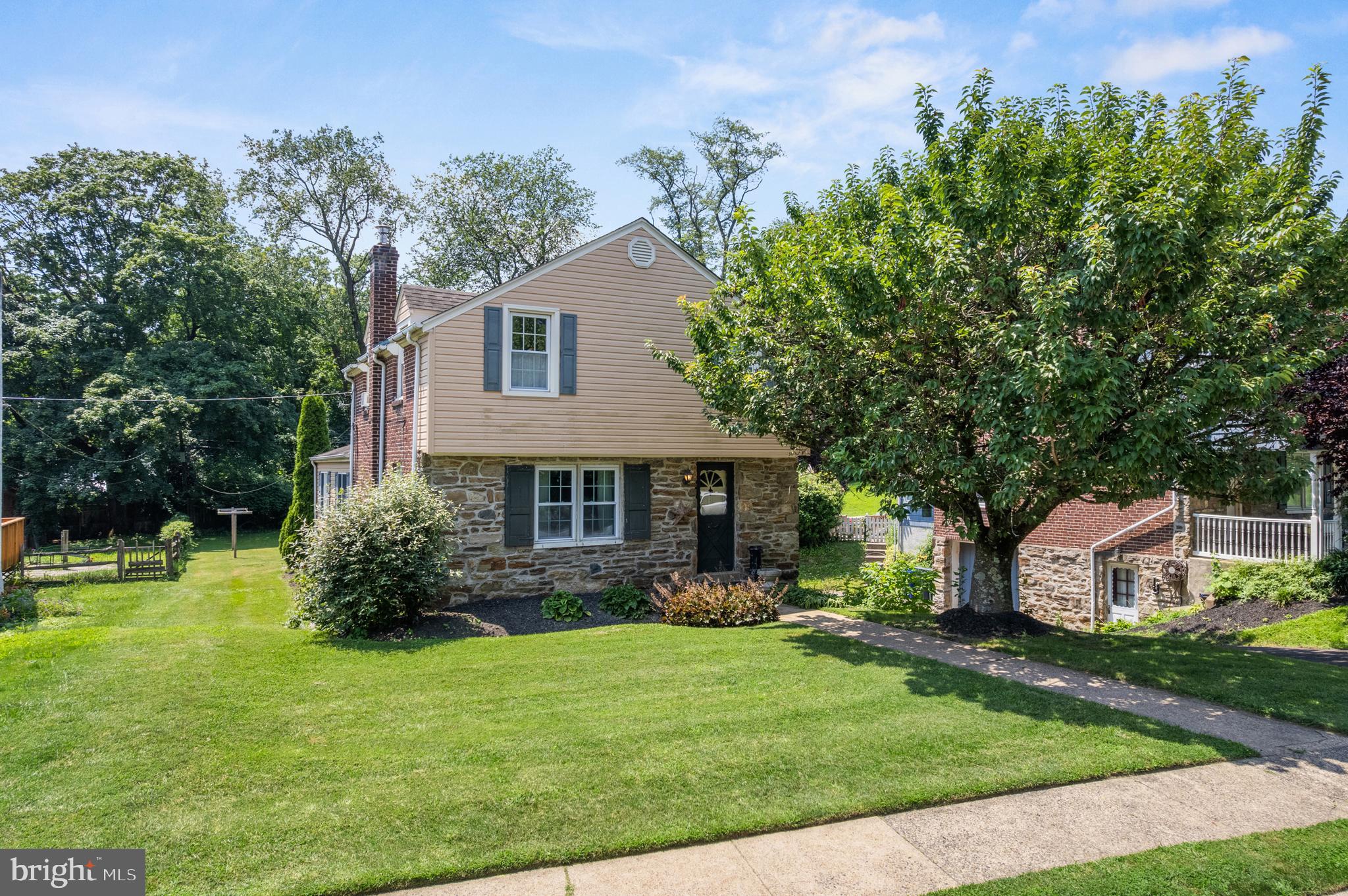 Nestled in one of Glenside's most desirable neighborhoods, this lovely 3-bedroom, 1.5-bath Colonial offers a perfect blend of comfort and classic charm. The main level welcomes you with a spacious living room, perfect for gathering with friends and family. The formal dining room is ideal for entertaining, while the kitchen provides functional space for everyday living. The standout feature of this home is the expansive step-down family room, featuring soaring high ceilings and large windows, that create a bright and airy atmosphere. A convenient powder room completes the main floor. Upstairs, you'll find three generously-sized bedrooms, each offering ample closet space and natural light, as well as a full hall bathroom. This home also boasts a full unfinished basement, offering plenty of storage space and inside access to the one car attached garage. Outside, the large, private backyard provides a peaceful retreat, ideal for outdoor dining, gardening, or simply relaxing in your own space. Prime location, just minutes from top-rated schools, parks, shops, and dining. This one wont last long, schedule your showing today!