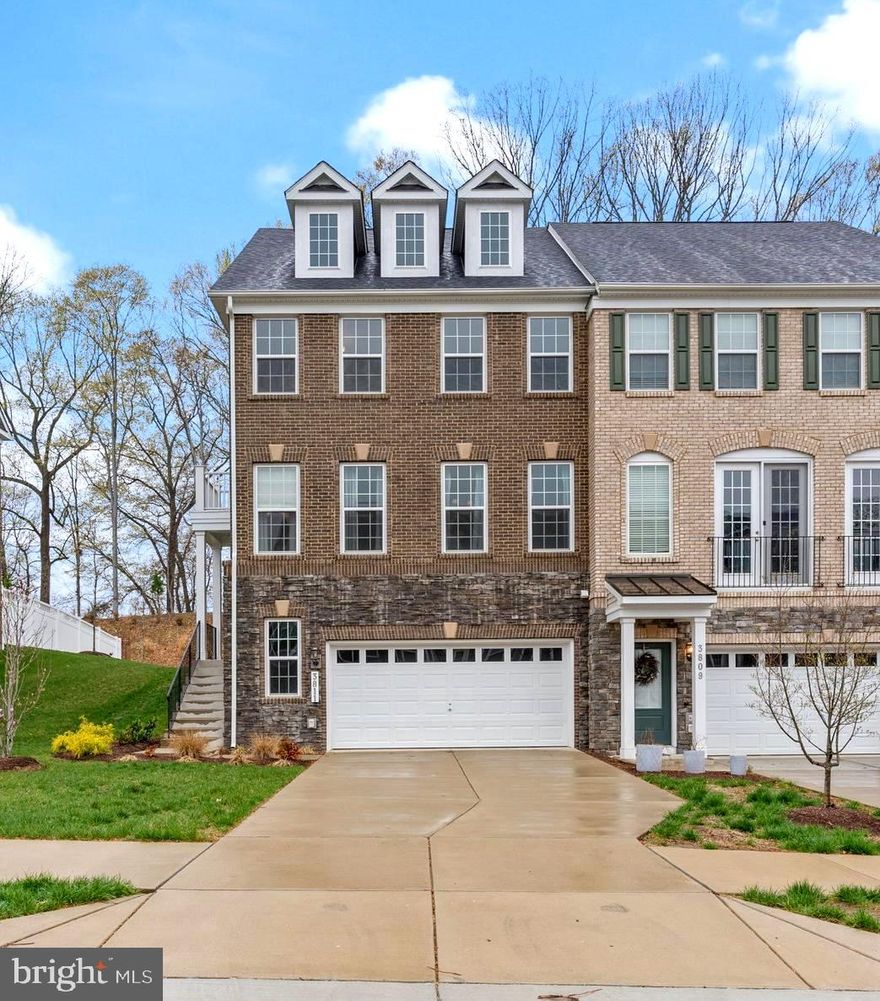 This exceptional end-unit townhome with a 2-car garage surpasses new construction standards. Boasting three bedrooms, two full bathrooms, and three half bathrooms across four levels, this home offers a spacious layout perfect for modern living. The main level features a bright and airy family room that seamlessly connects to the gourmet kitchen, equipped with high-end stainless steel appliances. The adjoining dining area is complemented by a convenient half bath. Accessed from the family room, a large, private, fully fenced-in yard provides the perfect outdoor space for relaxation, entertaining, or play.
Upstairs, you’ll find the luxurious primary suite with a gorgeous bathroom and large walk-in closet, two additional spacious bedrooms, another full bathroom, and laundry area. The fourth level features a versatile loft—perfect for a private home office, guest suite, or entertainment area and another half bathroom for convenience. The rooftop deck offers stunning peaceful views, making it an ideal space for relaxation year round.  
The fully finished lower level is a fantastic recreation area, perfect for family gatherings, entertainment, or as a multifunctional space for play and relaxation. It also includes an additional half bath for convenience.
With loads of natural light throughout, this home offers comfort and elegance in an exceptional location, just 15 minutes to Andrews AFB and downtown DC, and minutes from major commuter routes! Schedule your visit today!