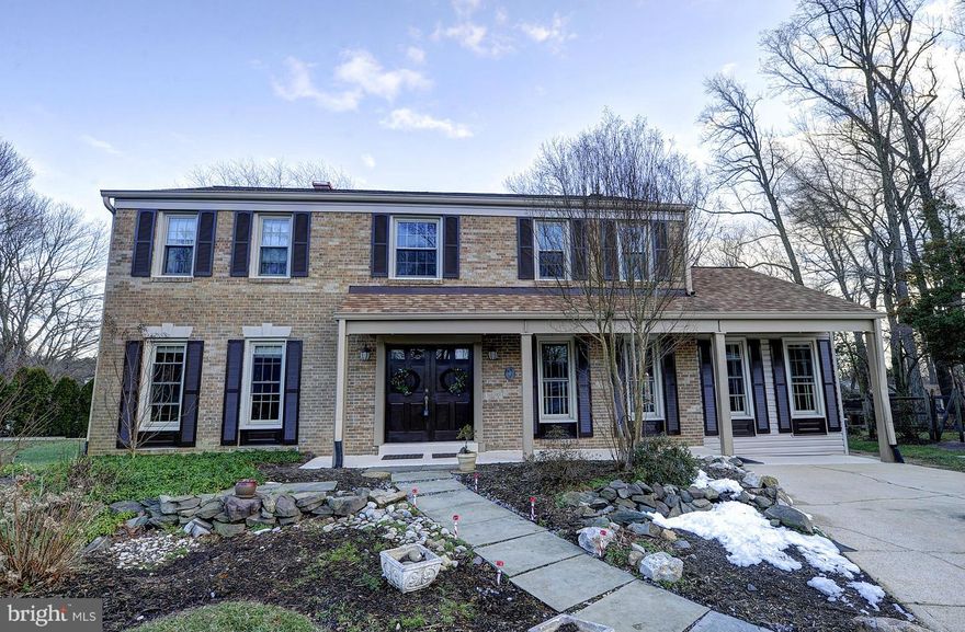 COMING BACK TO MARKET SOON.Stunning brick Colonial situated on .26 acre landscaped lot on quiet cul de sac. Large family room with wood burning fireplace. Light-filled LR & DR w hardwoods, table space Kitchen w new SS appliances.  4 generously sized BRs. Renovated Master Bath. Finished LL New windows, new roof, outstanding condition! Very nice private front and back yards.