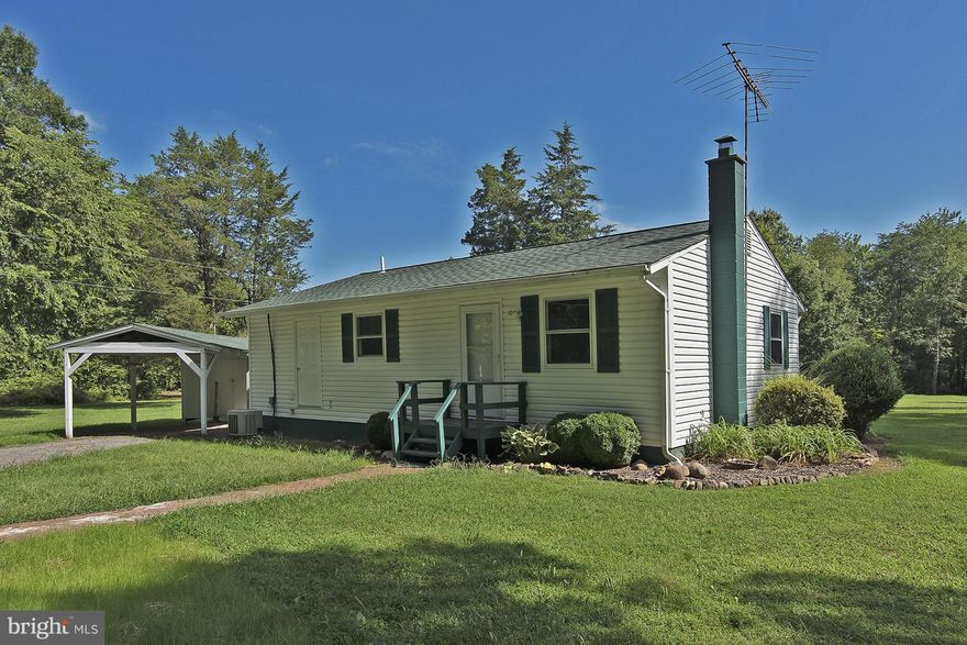 Are you tired of renting? Great starter or retiree home with easy access to shopping and commuter routes. Wood floors, and country views:  FIVE ACRES INCLUDING A STOCKED POND-plenty of room for gardening/anima!s! New stove, Newer HVAC and Roof, located on a beautiful country road. Enjoy the lovely back deck, and the serenity of the surrounding area. . .Why rent, when you can buy!!   Welcome Home!!